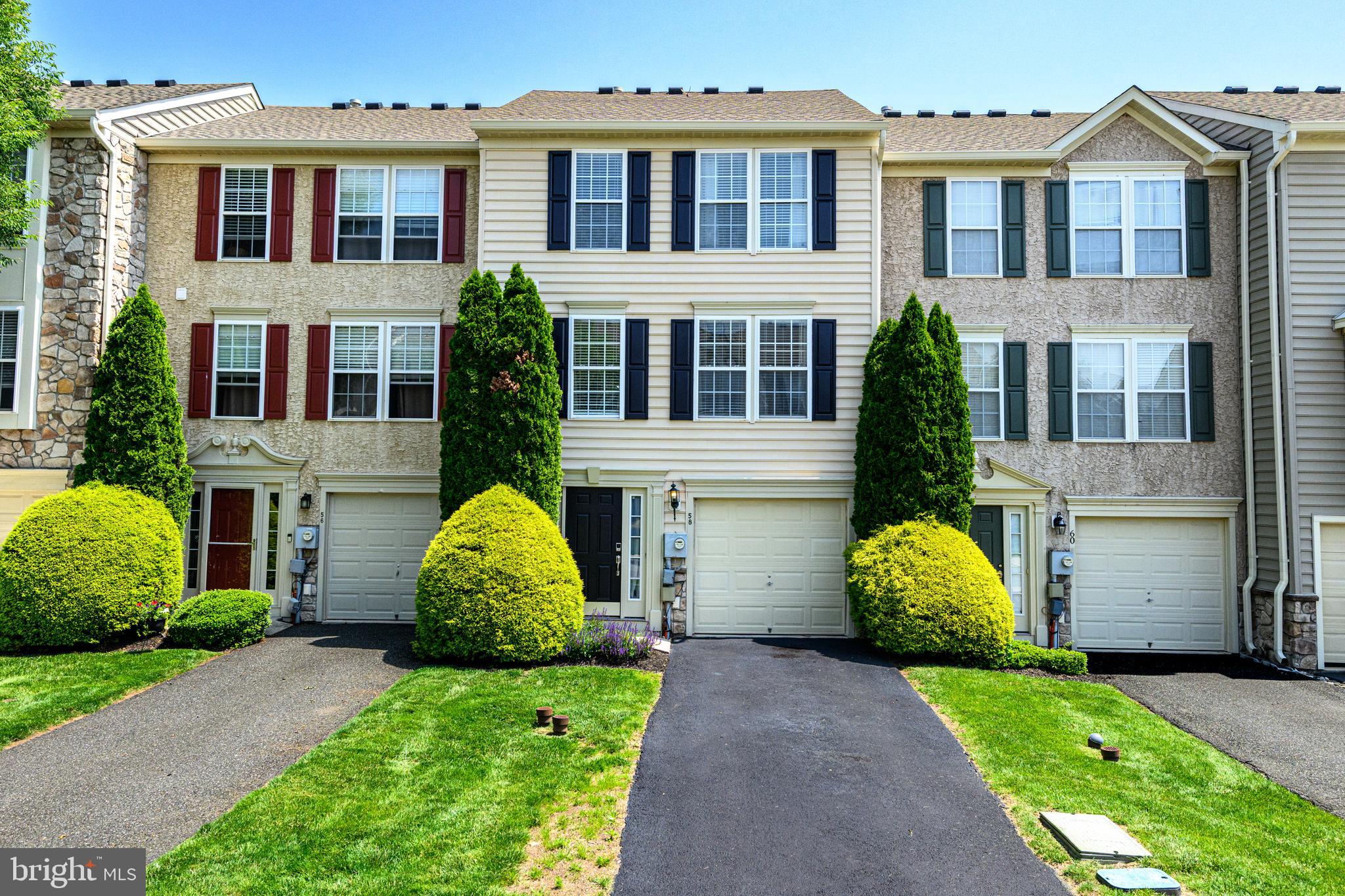 Welcome to 58 Dare Lane, a spacious three-story townhome in the highly sought-after Coventry Glen community, located within the award-winning Owen J. Roberts School District. This home is set on a premium lot backing to a peaceful pond, offering added privacy and scenic views rarely found in the neighborhood. Inside, you'll find a bright and functional layout featuring neutral paint, a kitchen with tile backsplash and a large island. The HVAC system was replaced in 2021, ensuring year-round comfort and improved efficiency. The walk-out lower level provides flexible space perfect for a home office, playroom, or gym. Enjoy outdoor living on the rear deck overlooking the pond. The $180/month HOA includes trash removal, lawn care, snow removal, and common area maintenance—making for easy, low-maintenance living. The roof was replaced in 2023, so all major components have been taken care of. Conveniently located near Route 422, Route 202, and the PA Turnpike, this home offers a perfect blend of comfort, location, and value. Schedule your private tour today!