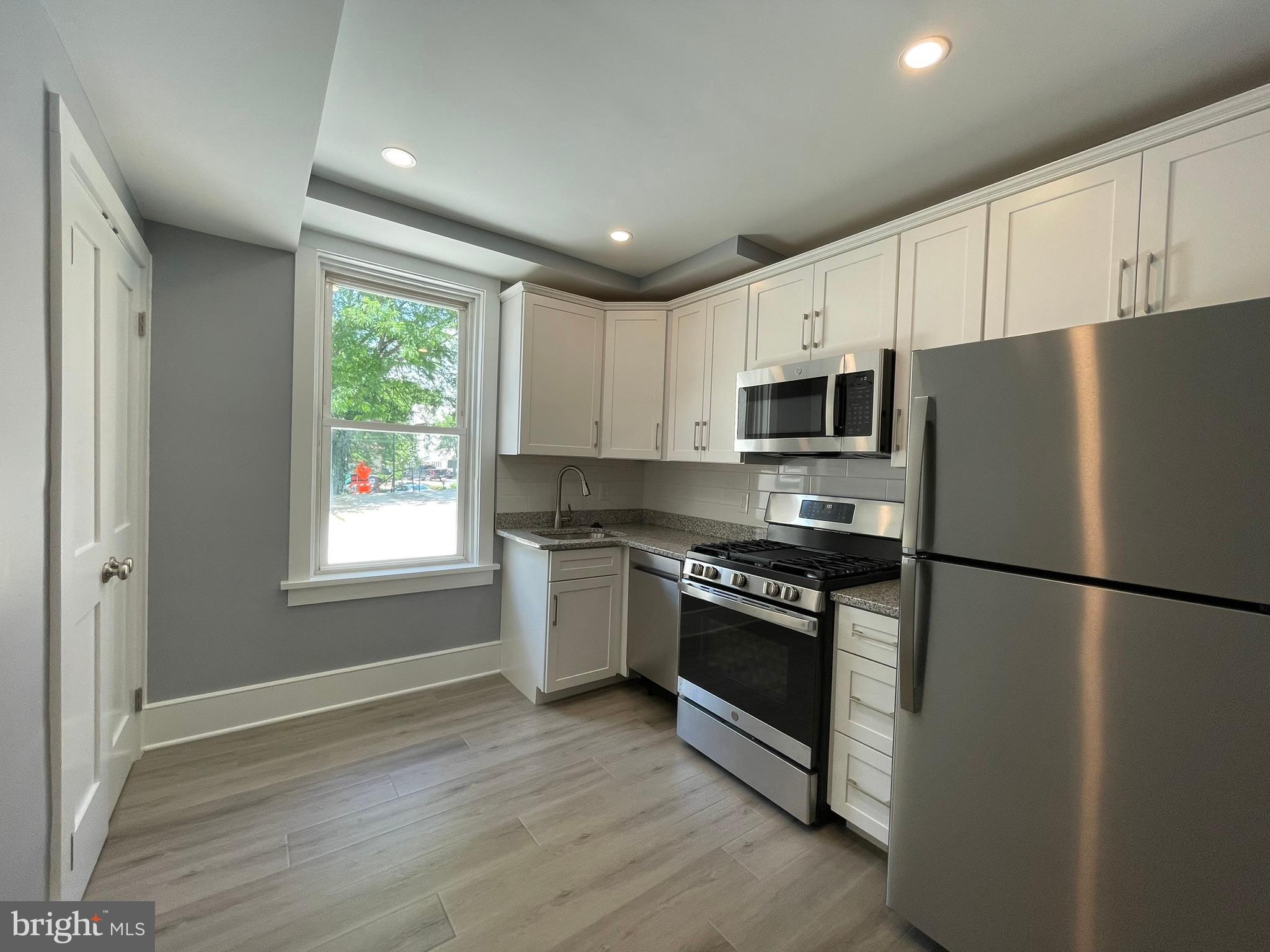 Charming Renovated One-Bedroom Apartment in the Heart of Doylestown Borough! Located just above the Bucks County Running Company, this beautifully updated second-floor apartment offers both character and modern convenience. Step into a bright, cheerful kitchen featuring brand-new white, soft-close cabinets, granite countertops, a stylish tile backsplash, and a full suite of new appliances. The entire apartment has been freshly painted, with plush new carpeting in both the living room and bedroom, creating a warm and inviting atmosphere. The bathroom boasts a sleek new glass and tile shower, contemporary vanity, new toilet, and elegant tile flooring. Enjoy the ultimate Doylestown lifestyle, just a short walk to top-rated restaurants, boutique shopping, and public transportation. No smoking. No pets permitted. Schedule your private showing today!