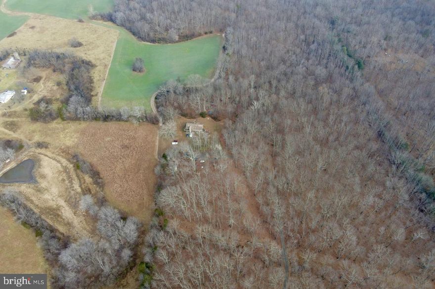 Expansive 100.95-Acre Estate in Scenic Marshall, Virginia.
Once-in-a-lifetime opportunity to own nearly 101 acres of prime Virginia countryside in prestigious Marshall in Fauquier County—renowned for its rolling hills, equestrian heritage, and proximity to Virginia's renowned wine country.
This exceptional property combines a well-established 1977-built single-family rambler/rancher-style residence (3 bedrooms, 2.5 bathrooms across two spacious levels) on a peaceful 7-acre homesite with an adjoining 93.95-acre parcel of open fields and wooded areas. The total 100.95 acres offer endless possibilities: ideal for equestrian facilities, farming, outdoor recreation, conservation, or potential subdivision/development of the larger parcel for an additional homesite (subject to county approval).
Key Parcel Details (sold together as one offering):
Residence & 7-acre homesite: Tax ID 6945-00-1781
Adjoining 93.95-acre land parcel: Tax ID 6945-02-9112
The property is offered strictly in as-is condition, with no repairs, improvements, or concessions provided by the seller.
Whether envisioning a private family compound, agricultural venture, horse farm, or long-term investment in one of Virginia's most desirable rural counties, this estate provides unparalleled space, privacy, and natural beauty less than 1 hour from Washington DC and close to all major highways. 
Contact for additional details, including the full survey and HD drone video.