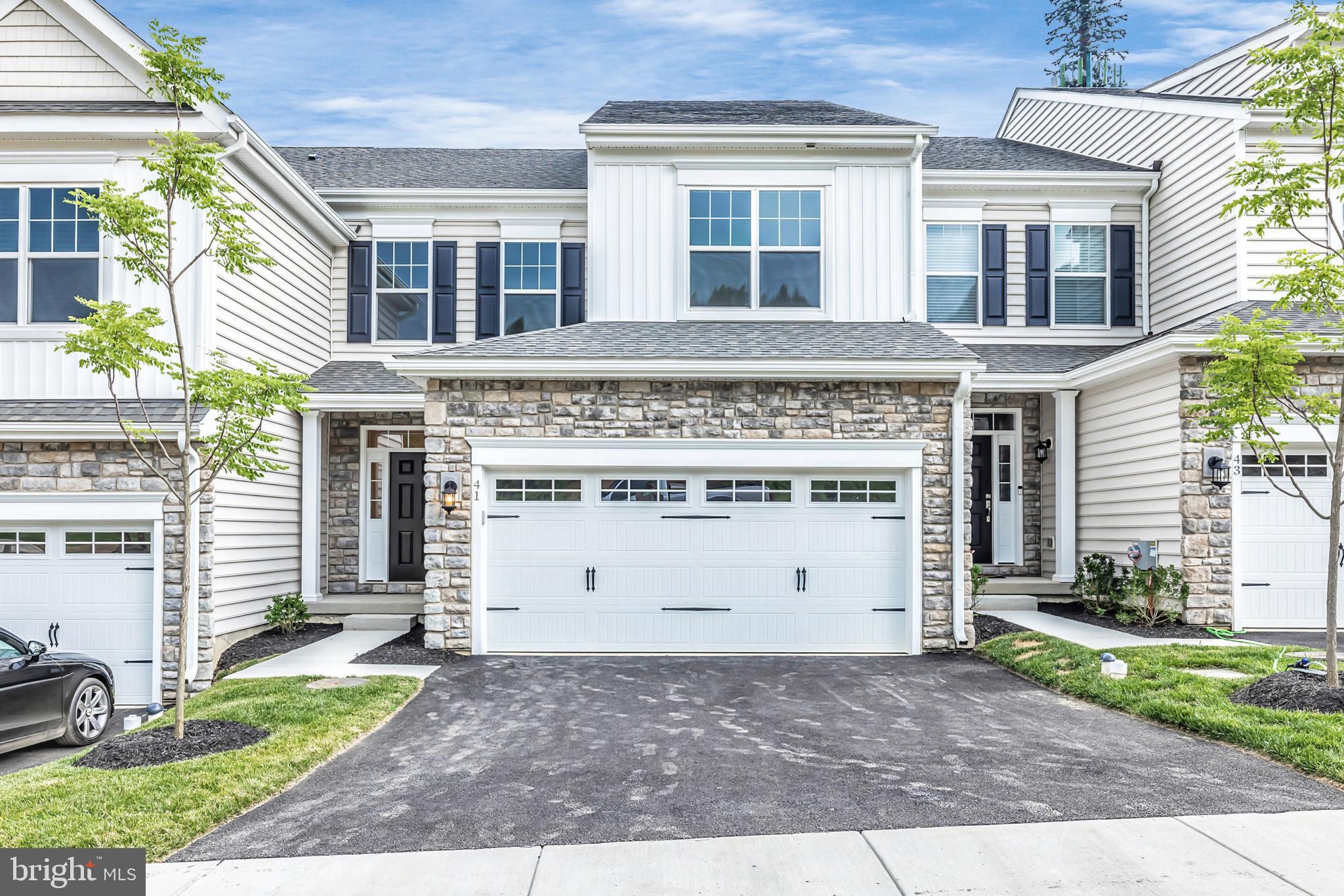 Don't miss this Move-In Ready Home in the Willistown Point community filled with many upgraded and beautiful features. Ready to settle and be in before the school year starts in the Great Valley School District. Willistown Point is a luxurious enclave of only 39 luxury carriage/townhomes homes in Willistown Township, Chester County. Located in the Great Valley School District near the most popular boroughs and cities in Southeastern Pennsylvania such as Newtown Square, West Chester, King of Prussia, Malvern, and Media.
Our Designer finishes include a gourmet kitchen, 9' tall 1st, and 2nd-floor ceilings, 5" hardwood flooring in the foyer, kitchen, breakfast area, dining area and great room and powder room. A two-car garage w/carriage-style garage doors with a wireless/keyless opener. This Exeter home includes both 4' Great Room and 4' Breakfast Room extensions. The gourmet kitchens include 42" tall Century kitchen cabinets with crown molding, oversized kitchen island with quartz countertop, 5 burner gas cooktop, vented stainless steel hood, built-in microwave over the built-in oven and dishwasher. The Finished basement has 9' foundation walls with rough-in plumbing for a future bathroom. The great room with a triple window including transoms on the back wall of the home for additional sunlight. The owner's bathroom has upgraded tile and our added Deluxe Shower package. The oversized primary shower includes a 12"tile shower seat, tile shower floor and a frameless shower door. Rouse Chamberlin Homes provides a 1year, 2year major mechanical components, and a 10-year structural warranty included with every quality-built Rouse Chamberlin Home. The photos shown are the actual finished Exeter home.
The Willistown Point community has beautiful landscaping, natural and paved walking trails, and a pocket park to meet with your new neighbors. It resides in the award-winning Great Valley School District which currently ranks in the Top 20 Best School Districts in Pennsylvania.