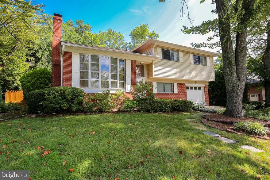 Updated home in Wyngate-  walking distance to NIH, close to Walter Reed and YMCA.  Freshly painted with upgraded flooring throughout. Features updated kitchen with granite countertops and stainless steel appliances, hardwood floors, spacious family room with brand new flooring, office/play area, lower level bedroom and full bath, 1 car garage & more! Large cleared/ usable yard with deck. 2 year minimum, no pets.