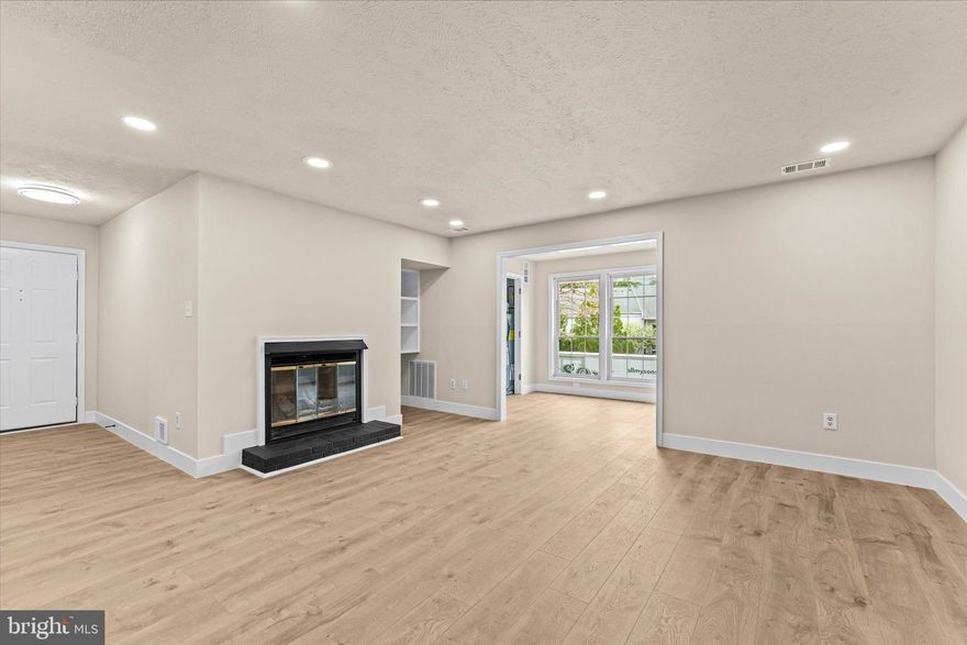 A bright beginning  in Oakton! Step inside and feel instantly at home. This spacious 2-bedroom, 2 bath condo in the heart of Oakton blends comfort, charm and convenience all in one. Sunlight pours through the oversized windows, dancing across the brand-new floors and casting a warm glow throughout the open layout. The entire unit has been freshly painted, creating a clean, cohesive feel from room to room. 

The kitchen?  It has been  tastefully  updated and ready for your morning coffee rituals with granite counters and stainless steel appliances--ready for everyday meals or impromptu  dinner nights in. 

In the living room, a cozy decorative fireplace (not currently in use) anchors the space, while the bonus sunroom offers a perfect spot to work, unwind, or simply soak up the natural light. Just off of the sunroom, step out onto your patio--ideal for morning coffee or a little fresh air at the end of the day. 

The bedrooms are peaceful and generously sized, and the refreshed bathrooms keeps everything feeling crisp and clean.  

Beyond the unit, the community offers a lifestyle of ease and convinience. Take advantage of the outdoor swimming pool, playground, and beautiful outdoor paths perfect for fresh air, excercise, or a peaceful stroll.  Nearby parks like Blake Lane--complete with a dog park-- and Borge Park with its own playground are just minutes away. 

With open parking (two permits per household) and ample visitor spots, daily life stays simple. And with quick access to I-66, Route 123, and the vienna Metro, commuting and weekend plans are always within reach--along with endless shopping, dining and entertainment options. 

Looking for a place that feels just right? This could be it.