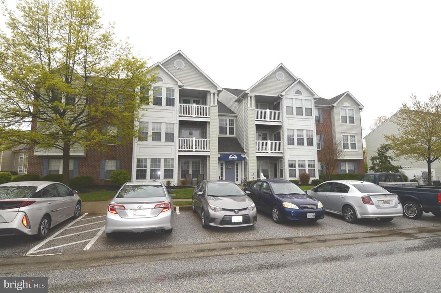 POPULAR FIRST FLOOR PATIO UNIT. GREAT LOCATION! EASY WALK OUT ACCESS TO PARKING JUST A FEW FEET AWAY  CONVENIENT TO I-95, WHITE MARSH SHOPPING AREAS   FEATURES INCLUDE: BEAUTIFUL LAMINATE FLOORING ,LOOKS LIKE HARDWOOD BUT  SO MUCH EASIER TO MAINTAIN  , WALK-IN CLOSET, SPACIOUS HANDICAPPED READY BATHROOM WITH NEW SINK, TOILET  AND FLOORING   36 WIDE DOORS  CENTRAL AIR & GAS HEAT  NEW FURNACE 2017  WATER HEATER 2015 NEW DRYER