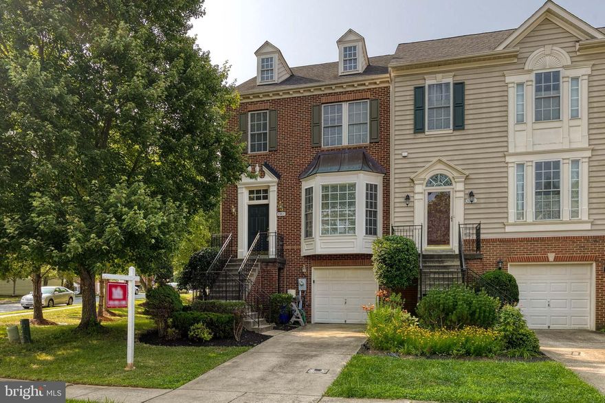 Tucked away in the highly sought after Waverly Woods community is this incredible end of group garage townhome.  The entire home has been freshy painted a lovely neutral grey tone, and the hardwood floors have just been refinished. The living room is the perfect entertaining space with a bay window that allows for lots of natural light.  The kitchen/family room and dining room combination is HUGE and is ideal for holiday parties, dinner parties, or even a playroom/homework space for the kids.  The primary bedroom suite has a walk in closet with custom built ins, soaring ceilings, and a private bathroom.  The 2nd and 3rd bedrooms are a great size and share the hall bath.  There is an amazing lower level rec room with a walk out to the backyard.  It's the perfect place to watch the big game, set up a game room, or even a crafting space.  Welcome home!