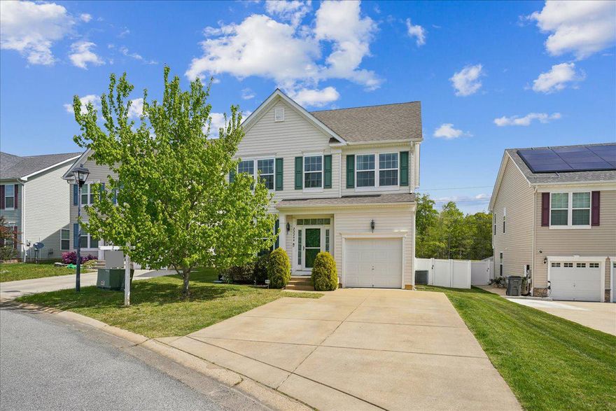 Welcome to this stunning Colonial nestled in the desirable Clement Pointe neighborhood. This beautifully maintained 4-bedroom, 3.5-bath home offers the perfect combination of comfort, style, and functionality.

From the moment you step inside, you’ll be greeted by a bright and inviting living room filled with natural light and enhanced by soaring 9-foot ceilings. The open kitchen and dining area is designed for both everyday living and entertaining, featuring a center island, beautiful wood cabinetry with abundant storage, a pantry, and generous counter space. Sliding glass doors lead to a spacious deck—perfect for summer grilling and outdoor gatherings—overlooking a fully fenced backyard that provides added privacy.

The main level also includes a convenient half bath and interior access to the attached garage.

Upstairs, the spacious primary suite offers a relaxing retreat with a walk-in closet and a private en-suite bath complete with double sinks, a soaking tub, separate shower stall, and gorgeous ceramic tile. Three additional well-sized bedrooms provide flexibility for guests, a home office, or hobbies. A conveniently located upper-level laundry room features vinyl flooring, a utility sink, and additional shelving for storage.

The fully finished lower level expands your living space with luxury vinyl plank flooring throughout, a full bathroom, and a large family room—perfect for movie nights, entertaining, or a play area. Walkout stairs provide easy access to the backyard.

This home truly has it all—space, style, and a fantastic location—making it a must-see!