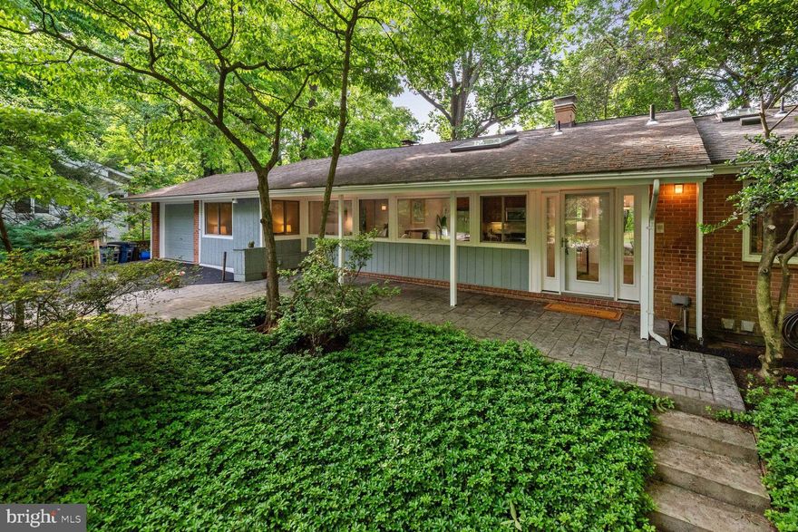 ***😄😄Welcome to 7705 Glenmore Spring Way, a mid-century modern residence situated in the highly sought-after Carderock Springs neighborhood of Bethesda. With 5 bedrooms and 3 bathrooms, this home offers comfortable living space and is in move-in condition. The main level has three bedrooms and two baths; There are two additional bedrooms and one bath on the lower level.  The high ceilings and large picture windows create a bright, inviting atmosphere. Enjoy a seamless blend of style and comfort;  Sliding doors from the Den, Living Room, and Recreation Room lead to the outside large deck and patio. Nestled in a tranquil, wooded setting, this home features a large lot with privacy galore and calming views.  Home improvements and updates have been made. Most recently (2024): the home was freshly painted, LVP was installed in the Recreation room and lower level hallway;  new carpets in the 2 bedrooms located on the lower level.  On 6/2018, the AC was replaced. In 2017, the downstairs windows, patio door, and deck were replaced. In 2013, the water heater and the majority of the roof were replaced. Two of the three skylights date back to 2/2024. The renovation of the entire upstairs of the house was completed in 8/2013. This included bathrooms, kitchen appliances, windows, doors and walls. This property is just minutes away from Carderock Springs Swim and Tennis Club, with pickleball, playground, and basketball facilities, the C&O Canal, and Great Falls Park as well as shopping in Potomac Village. One of the most popular neighborhoods known for its Mid-Century Modern homes in equally close proximity to DC, NoVa, and downtown Bethesda. Don't miss the opportunity to make this property your own!