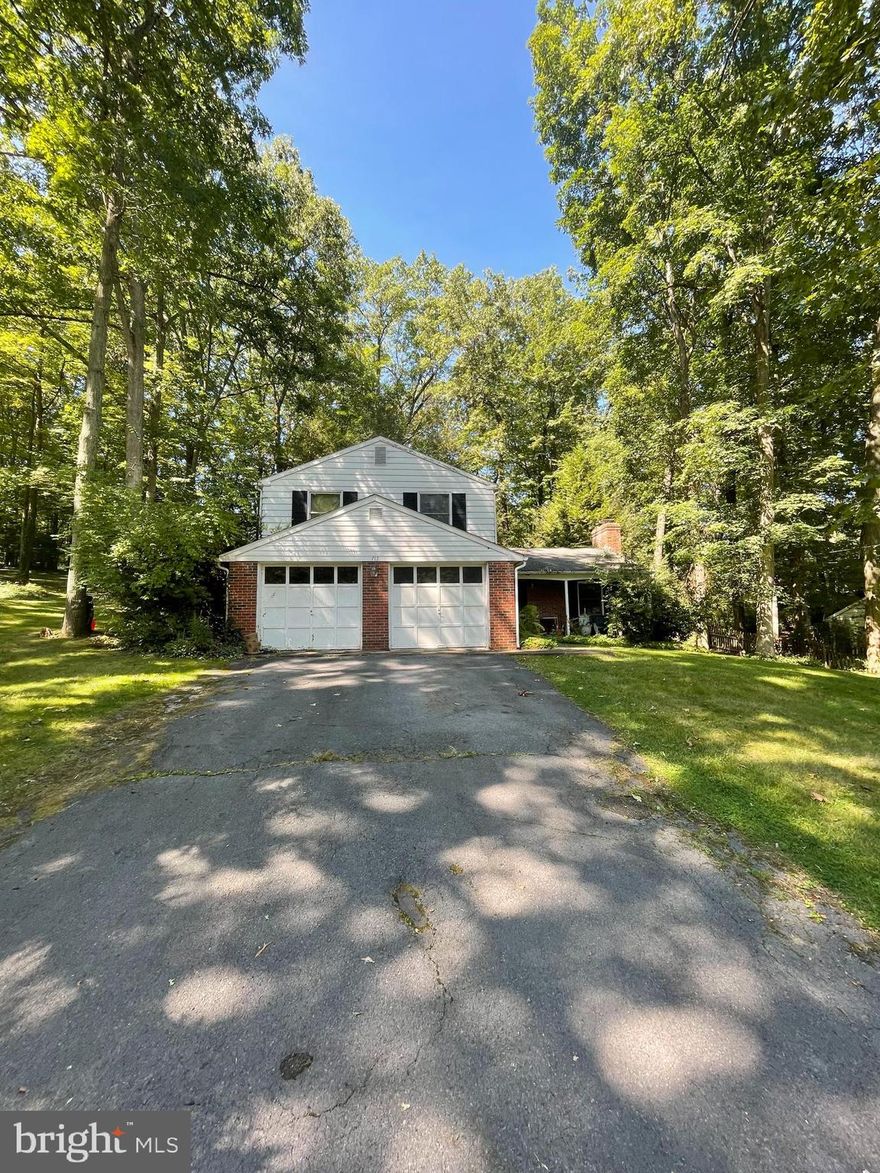 Spacious and cozy Park Forest Village home ! Living room offers fireplace, hardwood floors and beautiful built-ins. Family room has sliding door to patio. Home offers a beautiful and private back yard (large wooded private lot). Close to schools, shopping and the CATA bus line.  Home comes with a nice front porch close to Green Hollow Park. Plenty of space with 4 bedrooms and 2.5 baths. Potential to finish basement for additional living space. This home is in need of a little sweat equity but would be well worth the effort! Call today to schedule your showing!