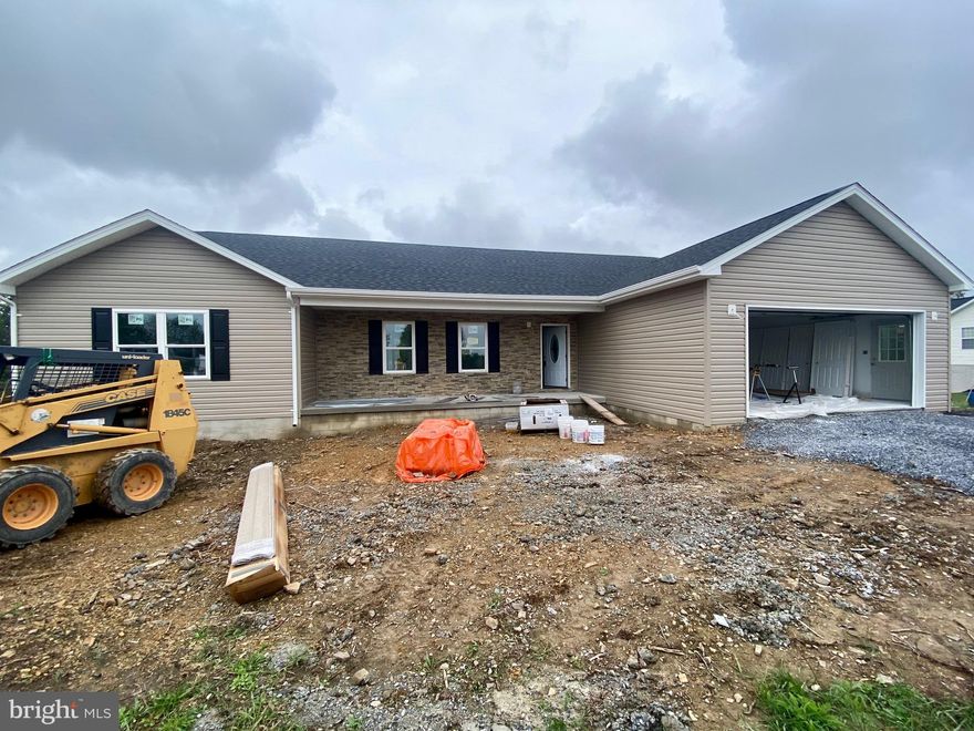 **UNDER CONSTRUCTION**, THIS 2000 SQUARE FOOT RANCHER WITH UNFINISHED WALK OUT BASEMENT WILL BE READY IN ESTIMATED 90 DAYS! Spacious one level living with all your must haves ... Luxury vinyl flooring throughout, split bedroom plan, upgraded countertops, stainless steel kitchen appliances, primary bath walk in shower with double sink vanity, vaulted ceilings in open concept kitchen/dining/living room, living room fireplace, and unfinished walkout basement with rough in for future full bath! Picturesque setting located just a couple miles over the VA/WV line and has MOUNTAIN VIEWS! Enjoy front porch sitting or entertaining on the HUGE 12 X 20 ft deck. Wooded rear yard for privacy. This is THE home that you've been searching for and just 15 minutes to Winchester Rt. 50 Walmart and minutes to Capon Bridge restaurants. 1 year builders warranty.