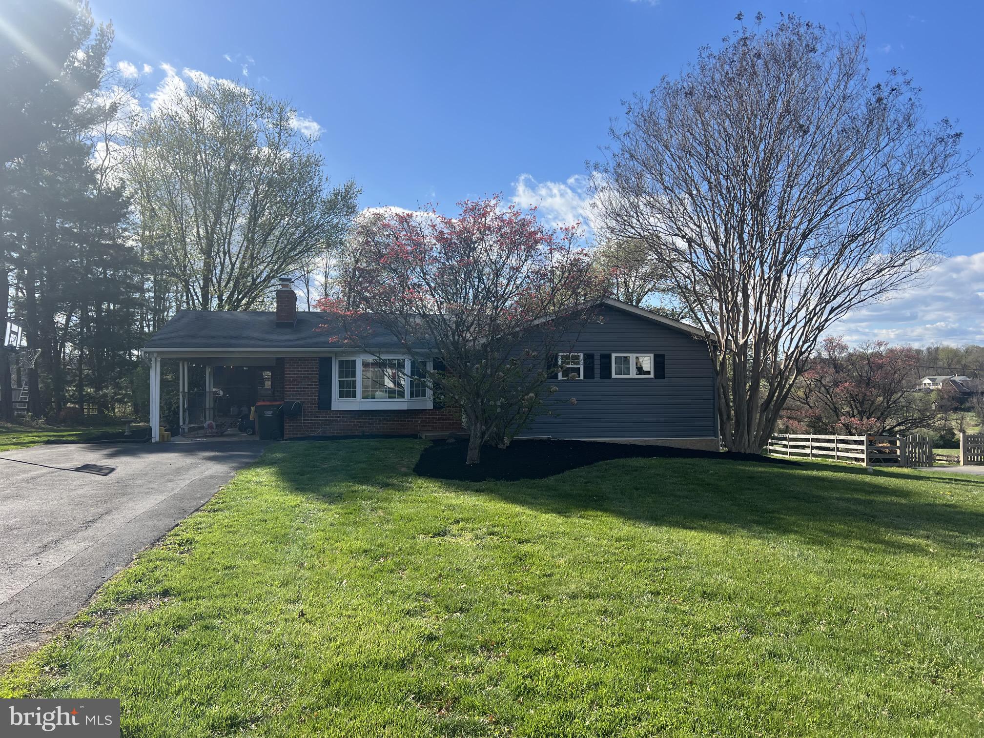3 Bedroom, 2 Bathroom Detached home nestled on a quiet "no outlet" street in the heart of Eldersburg. Driveway easily fits 6 cars, the use of the carport adds a seventh option. The front and rear yard are very large and maintained by a professional landscaper. Enter through the front door where the mud room allows space for shoes and jackets. Inside, the hardwood floors, the updated fireplace, and the built-in shelving add to the charm of the home. The laundry is situated close to the bedrooms for easy access. The master suite has a private bathroom and built-in custom storage closets. The additional two bedrooms both have large windows, with the third bedroom overlooking the yard and farm beyond. The kitchen is small but mighty! It's very well laid out and is cute and functional. The separate dining room has french doors to the carport which can be used to access the screened porch and back yard.
***please note, the basement is NOT included in this rental, and is occupied. They have their own parking pad separate, with a separate entrance. There is no access from the basement to the main level.***