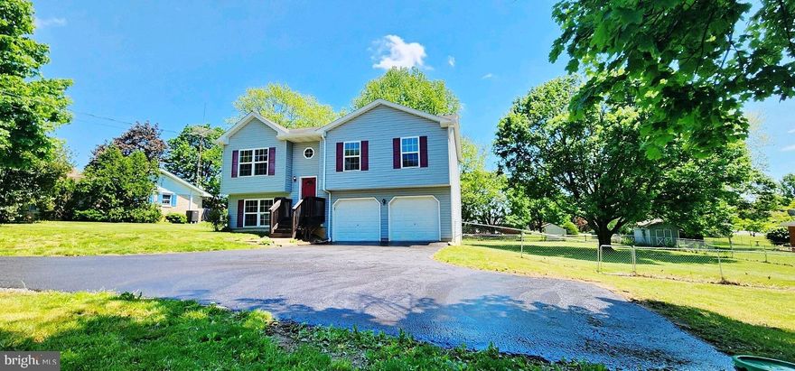 Beautiful Bilevel with a Fantastic Yard! Nicely cared for Home featuring a Large Eat In Kitchen w/ Stainless Steel Appliances, Attractive Oak Cabinets, Oven-Range, Built In Microwave and Dishwasher, Luxury Vinyl Plank Floor, This Home's Primary Bedroom has its own Private Bath w/Shower Stall, (3) Total Bedrooms and (2) Full Baths, Great LL Family Room and Laundry, Garage egress to back yard, Nice rear Deck accessed thru Kitchen Area , Quiet private fenced rear yard This Home is Move In Ready, Oversize 2 Car Garage, Plenty of Parking, The fenced rear yard has plenty of room for Children to play, Pets and Outdoor Activities!