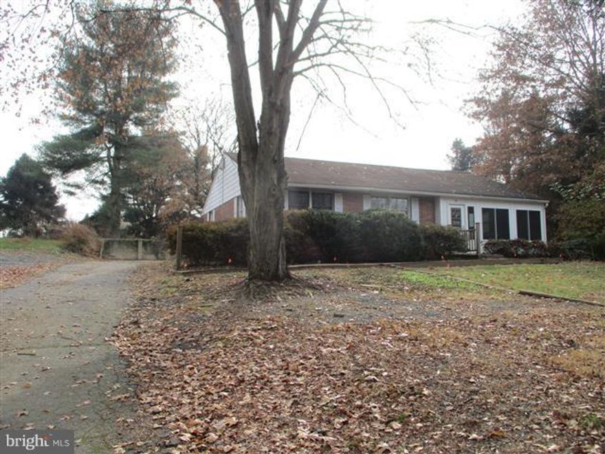 Nice size Rancher on .60 acre lot. Huge driveway with plenty of parking. Over sized 2 car garage with work shop in rear. Enclosed sun filled front porch. Open floor plan on main level.  Kitchen has plenty of cabinet space. 3 main level bedrooms with generous closet space and 2 full baths. Lower level is finished with club room or family room and ample storage space. OPENS TO INVESTORS 12.28