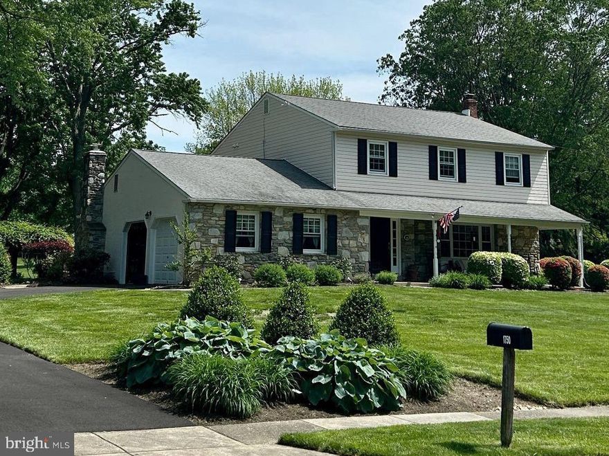 Welcome to 1750 Clinton Drive located in the heart of the ***Executive Estates*** neighborhood in the Award Winning School District of Upper Dublin! Enter this 4 bedroom Stone Colonial that features a  2 story entry foyer with beautiful turned staircase, hardwood floors,  and two coat closets.  Kitchen with custom design has solid wood cabinetry,  granite island/counters, tumbled marble back splash, under counter lighting, stainless steel appliances & separate pantry closet.  Kitchen opens to family room with stone fireplace and convenient gas insert.   Large formal  dining room with chair rail and crown molding,   spacious living room w crown molding and large picture window.  Upstairs has a large landing leading to main bedroom with with newer tile bath w walk-in shower,  separate sink/dressing area and walk-in closet.  Three additional nice sized bedrooms w large closets. 4th bedroom currently used as an office and has 2nd floor laundry closet.  Hall bath has ceramic tile tub/shower with wainscoting.  Downstairs has Large finished basement  with loads of closet storage.   Replacement windows,  hardwood floors and six panel wood doors t/o.  Beautifully landscaped lot with large welcoming front porch, park-like setting view in the back yard to enjoy on nice paver patio.  Two car garage with additional storage, large shed.   Front entrance door and rear exterior doors recently replaced.  Newer driveway and front walkway.  Easy access to major routes, shopping.  *** THANK YOU*** for showing - by Appointment Only- starting  Saturday May 24!!!
