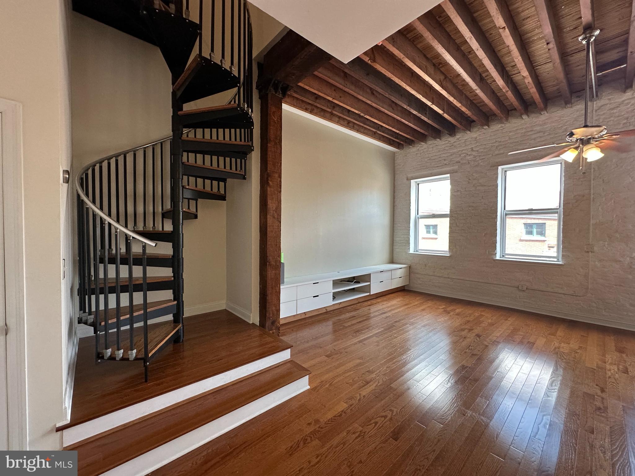Welcome to 141-45 N 2nd St unit#3C! This stunning 2-bedroom, 2-bathroom condo unit features exposed brick walls, large windows, in-unit laundry, hardwood floors, and so much more! Main floor boasts an open layout with an expansive great room with soaring ceilings & spacious kitchen area, and an island with a sink for additional prep-space and storage. Upstairs, you'll find two sizable bedrooms with hardwood flooring and high ceilings overlooking historic 2nd Street & the Ben Franklin Bridge. The master bedroom offers a separate dressing area with 2 double-door closets and an ensuite bathroom. The building features an amazing shared outdoor courtyard that is beautifully landscaped. There is also an extra assigned storage space in the basement. This home combines historic Old City character with modern amenities. Located in a boutique building on a Cobblestone Street with convenient access to all the amenities of Old City! Must See to appreciate. Schedule your visit today!