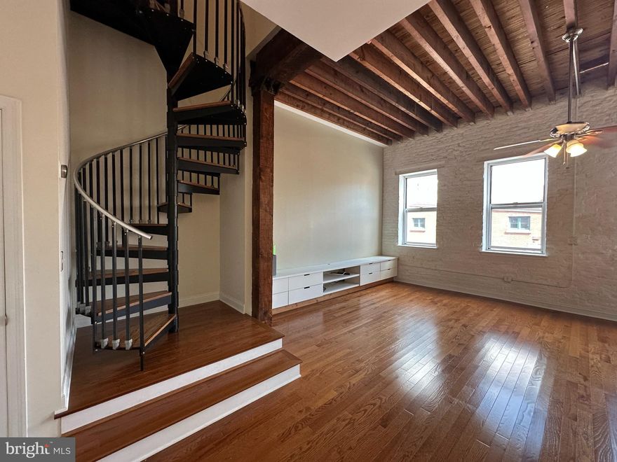 Welcome to 141-45 N 2nd St unit#3C! This stunning 2-bedroom, 2-bathroom condo unit features exposed brick walls, large windows, in-unit laundry, hardwood floors, and so much more!  Main floor boasts an open layout with an expansive great room with soaring ceilings & spacious kitchen area, and an island with a sink for additional prep-space and storage. Upstairs, you'll find two sizable bedrooms with hardwood flooring and high ceilings overlooking historic 2nd Street & the Ben Franklin Bridge. The master bedroom offers a separate dressing area with 2 double-door closets and an ensuite bathroom. The building features an amazing shared outdoor courtyard that is beautifully landscaped. There is also an extra assigned storage space in the basement. This home combines historic Old City character with modern amenities.  Located in a boutique building on a Cobblestone Street with convenient access to all the amenities of Old City! Must See to appreciate.  Schedule your visit today!