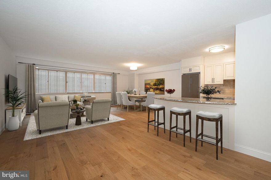 Beautifully renovated and move-in ready, this spacious 2-bedroom, 1-bath residence offers 1,130 square feet of stylish living in the highly desirable Penn Center House, located in the heart of Rittenhouse Square.
The thoughtfully designed open floor plan features stunning wide-plank hardwood floors throughout and a bright, expansive living area that flows seamlessly into the newly opened kitchen. The kitchen is outfitted with cream cabinetry, granite countertops, stainless steel appliances, and a convenient breakfast bar—perfect for both everyday living and entertaining. The generously sized primary bedroom boasts a walk-in closet, while the second bedroom offers flexibility for guests, a home office, or additional living space. The beautifully updated hall bathroom includes a sleek walk-in shower. Additional highlights include in-unit laundry and ample storage throughout. Residents of Penn Center House enjoy exceptional amenities including a beautifully maintained rooftop deck with city views, a community room, and a library. This well-managed, owner-occupied building offers access control, front desk coverage, and on-site maintenance for added convenience and peace of mind. Ideally situated just steps from Rittenhouse Square, this prime location provides easy access to Philadelphia’s premier dining, shopping, cultural attractions, and museums, and is within the highly regarded Greenfield K–8 catchment.
The monthly co-op fee includes all utilities, basic cable, and real estate taxes. Gym memberships are available for an additional fee, as well as parking at a discounted rate. Financing options are available through First Trust and CrossCountry Mortgage.