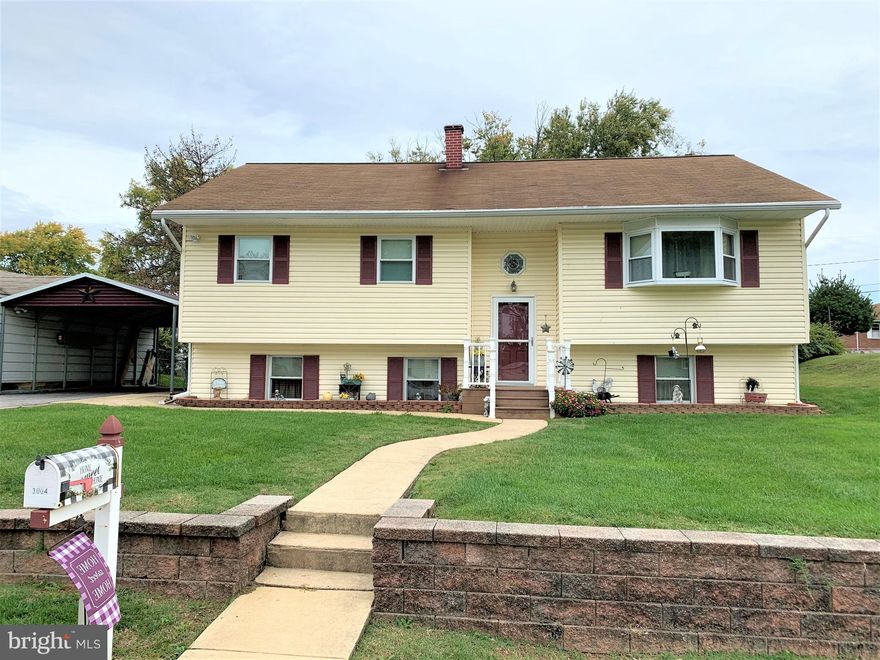 Lovely oversized split foyer featuring 3 bedrooms and 2 full baths with potential for additional bedroom in basement.   Beautiful kitchen offers granite counters, breakfast bar and black stainless steel appliances which are only a few years old.  You will love spending time on the maintenance-free covered deck overlooking salt water pool!  Large fenced-in yard for outdoor activities!   Main bath has been updated and includes jetted tub to soak your stress away!    Inviting basement with family room and built in bar with wet bar and fridge; great for indoor entertaining!  This is a great home to invite friends and family!  Pull down attic for additional storage!  Hurry and come see this spectacular home!!