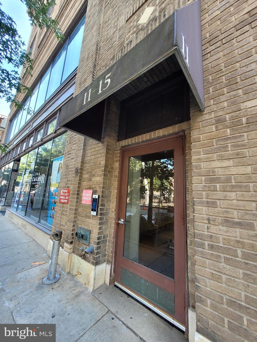 Enjoy the comfort and convenience of living in the Old City neighborhood at Churchview Condominiums. As you enter the secure building, you will be greeted by an attractive lobby with exposed brick, comfortable seating and an elegant curved stairway, as well as direct access to the elevator, taking you up to the 3nd floor of this end unit condo. The moment you enter this home, be amazed by the openness with a soaring 14 foot, exposed wood ceiling, creating a spacious and airy atmosphere. The open floor plan provides a seamless flow throughout the living space which is complemented by large, newer windows almost 8 feet in height opening on a southern view. Additionally, there is a renovated wood-burning fireplace, for those chilly Old City winter nights. The kitchen offers ample storage and counter space which includes a porcelain sink, garbage disposal, new dishwasher, electric range and pantry closet. This room also directly opens to the dining room as a pass-thru and has great potential for a breakfast bar. The Dining Room is spacious and has marble-like tiled flooring. The Primary Bedroom is bright and airy, also boasting a 14 foot exposed wood ceiling and brick wall. Wake up in the mornings as you see the view of the historic U.S. Custom House building. This spacious bedroom also includes a large, walk-in closet. Across from the bedroom is a generously sized Full Bathroom with Ceramic tiled flooring, a large vanity and with convenience in mind, it houses a convenient stackable washer and dryer. This bathroom also include additional storage as there are pull down stairs to an attic (12'x12'). Another spectacular feature is the incredible shared ROOF DECK, which offers breathtaking views that are second to none. As you are relaxing enjoy soaking in the Ben Franklin Bridge, mesmerizing sights of Center City , the Delaware River and the Camden waterfront, not to mention the picturesque view of the Christ Church steeple. This pet friendly building is also conveniently located directly across the street to a fully fenced-in-yard at Christ Church, providing a convenient space for your furry friends to play. On Thursdays, you have the option to enjoy the convenience of shopping at the farmers market right behind the building. Parking is a breeze with street permits readily available, or you can rent a spot at one of the several nearby lots. With its prime location, commuting is convenient, as this building is only a block away from the entrance to I-95 and a few short blocks to the iconic Ben Franklin Bridge. Most importantly, Churchview Condos are just steps away from the 2nd St Market-Frankford Line Septa Station and stops for multiple SEPTA bus routes. Walk to the many restaurants and boutiques as you leave the building and enjoy the nightlife or take in the relaxation at the many nearby parks and historical sights as they are part of your neighborhood. Schedule your appointment today to experience the uniqueness and charm of this one-of-a-kind condo in the heart of one of Philadelphia's most desirable neighborhoods.