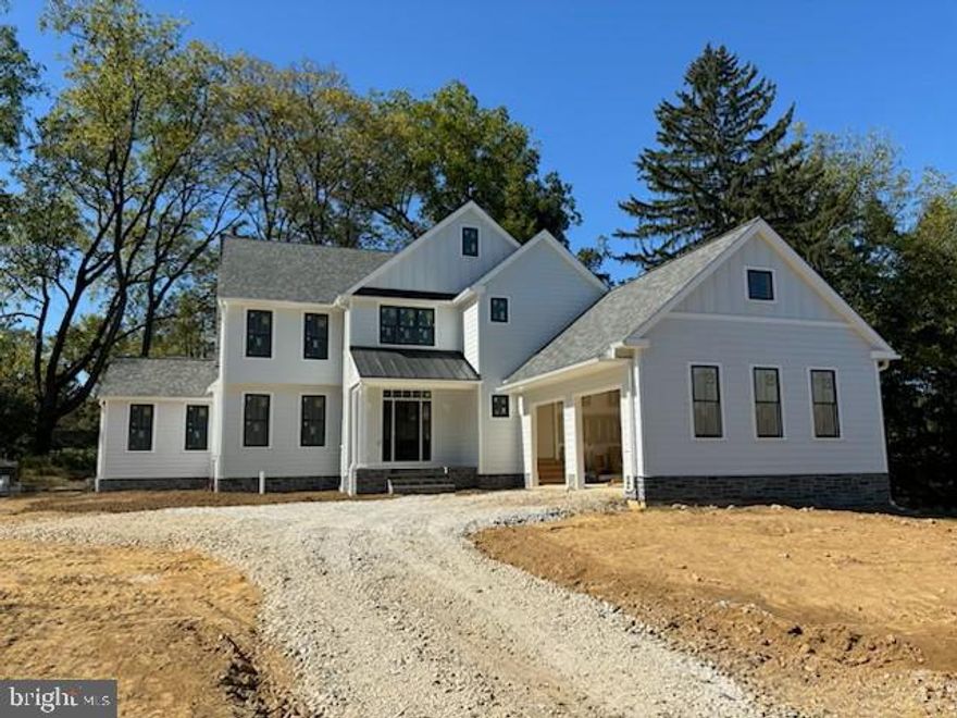 Discover your dream home at 103 Privet Lane, Radnor, PA 19087, a stunning new construction home nestled on a .34-acre lot. This exceptional 4-bedroom, 3 ½-bath home is part of an exclusive newly developed 6-parcel subdivision/neighborhood in Radnor, Upper Merion Township. Enjoy the tranquility of this private and serene setting, conveniently located on a cul-de-sac street with picturesque rolling vistas, and benefit from the low taxes in Radnor, Upper Merion Township.
Designed by JH2 Designs, LLC and crafted by D’Orazio Construction LLC, this home exemplifies custom luxury. The exterior boasts white Hardie board plank siding, a roof with 30-year CertainTeed Landmark Pro fiberglass shingles, and a side-facing 2-car garage with elegant carriage doors, all contributing to exceptional curb appeal. The property includes a sodded lawn and a landscaping allowance for the buyer.
Step inside through the inviting flagstone front walk and covered porch entry, and be greeted by a foyer adorned with site-finished white oak hardwood floors which are found throughout the home. To the left, a formal dining room awaits, perfect for hosting gatherings. The heart of the home is found in the rear showcasing a sunlit gourmet kitchen, featuring Schrock Trademark Series cabinets, a large center island with MSI Quartz countertops and seating for four, and a GE Cafe stainless steel appliance suite. A breakfast nook separates the kitchen from the living/family room, where a gas fireplace creates a cozy ambiance.Next to the family/living room is an adjoining office, accessible through modern doors. The office features a second gas fireplace and a beamed, vaulted ceiling. The living/family room and kitchen open through glass doors to a rear flagstone patio, with an option for a covered patio available for an additional fee. An optional wet bar adjacent to the breakfast room is also an optional upgrade. The main floor also includes the laundry room, a mudroom with built-in cubbies and access to the 2-car garage, and a powder room. Space is available off of the foyer to accommodate an elevator as well for an additional fee.
Upstairs the primary suite includes two walk-in closets with laminate shelving and a luxurious bathroom featuring a Kohler Archer soaking tub, double sinks with Moen Voss chrome faucets, and a ceramic tile shower and flooring. Buyers can select their preferred tile and light fixtures with the provided allowances. The second floor also offers a second bedroom with an attached bath, two additional bedrooms with a Jack and Jill bath, and a linen closet.
This home is equipped with top-of-the-line, new HVAC systems, ensuring a worry-free lifestyle. Don’t miss your opportunity to purchase this home before it is fully completed. Photos will be added to the MLS as they become available.
This distinctive cul-de-sac reflects the early tradition of Radnor while providing modern conveniences. Each of the six custom homes is built with innovation and attention to detail. Two of the homes were built by E. B. Mahoney Builders and sold for $2.8MM. This ultra-convenient location is less than 1 mile to the Radnor train station, just 1.5 miles from the center of the shopping area in Wayne, 5 miles from Suburban Square and the Ardmore train station with Amtrak service to NYC, 12 miles from Philadelphia, and 4.5 miles from the King of Prussia Mall.
Radnor is a community rich with local history, once home to the Lenni Lenape Indians and first settled in 1665 by Quakers from Radnorshire, Wales. This area, known as Penn’s Greene Countrie, was officially founded in 1682 through a land transaction with William Penn. The land that includes 103 Privet Lane was part of the historically significant Brooke – Supplee homestead.
For GPS use: 231 W. Matsonford Road, Radnor PA. This is lot #3.