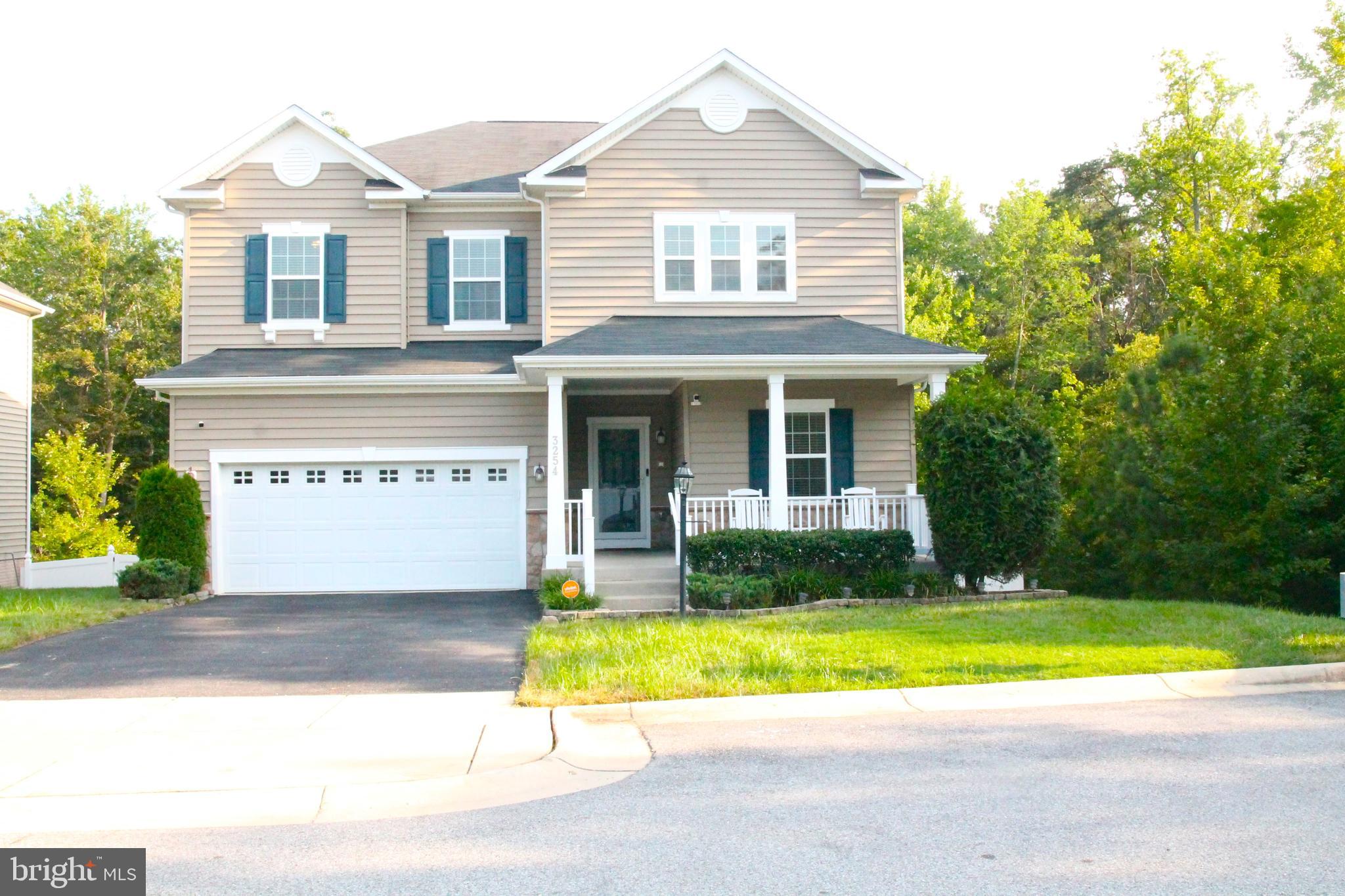 Discover the perfect blend of comfort, space, and style in this beautiful 5-bedroom, 4.5-bath home in the Middletown Woods community. With almost 4,000 square feet of thoughtfully designed living space, this home offers elevated features at every turn.
Step inside to an inviting open-concept main level, featuring a spacious living room and dining area that flow seamlessly into a gourmet kitchen. The centerpiece is a large island—ideal for entertaining—along with a walk-in pantry, dedicated office space, and a convenient half bath. Step outside to relax on your screened-in deck, perfect for enjoying the outdoors without bugs.
Upstairs, you’ll find the luxurious owner’s suite which features ample space, a walk-in closet, and an en-suite bath with separate vanities. Guests will enjoy three generously sized bedrooms, including one with its own private bath. A large hallway bathroom, two oversized storage closets, and a laundry room with custom cabinetry ensure functionality and ease for any lifestyle.
The fully finished walk-out basement is an entertainer’s dream or an optional in-law suite! It includes a fifth bedroom, full bath, and a stunning wet bar complete with a wine chiller, ice maker, and microwave. The sliding glass doors lead to a private patio, extending your living space outdoors.
Conveniently located near shops, restaurants, and commuter routes, this home truly has it all.