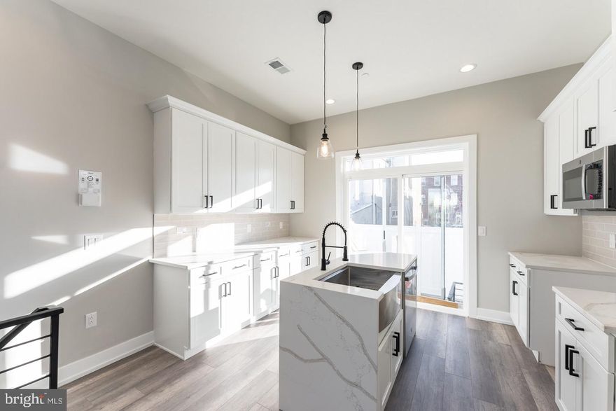 Welcome to this beautiful 3 bedroom/ 3 bathroom home that boasts hardwood flooring and immaculate, high-end finishes throughout the bright & open floor plan that will be sure to catch your eye! Enter through the spacious living room complete, and into the fully loaded Kitchen is equipped with stainless steel appliances and marble island countertops. Upstairs will feature large bedrooms with newly renovated full bathrooms. This house is complete with a private outdoor space and roof deck! Schedule your tour today!

Tenants are responsible for the following utilities: 
Water $50/mo flat fee (up to 2 people)
Electric (based on usage) 
Gas (based on usage, if applicable) 
Internet