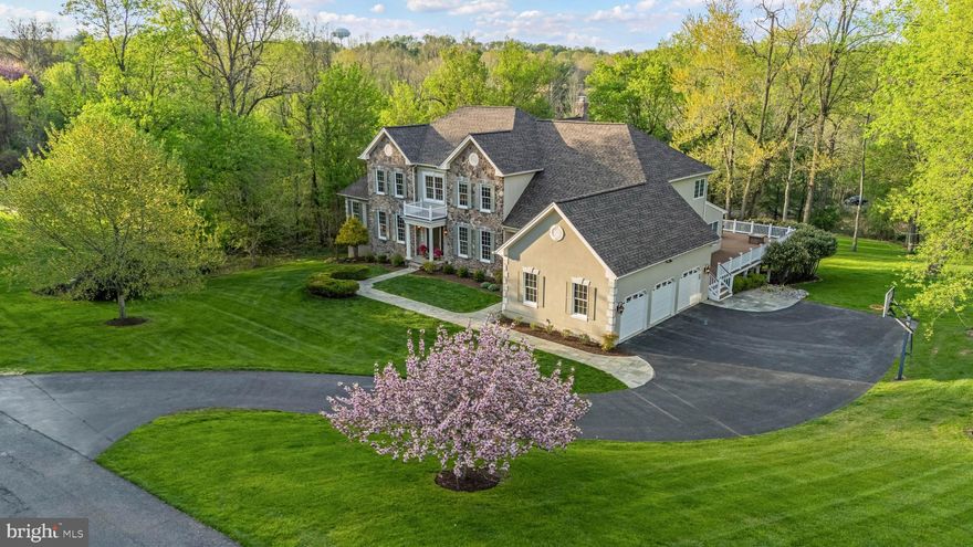 Live authentically. A rare offering in one of Baltimore County's most coveted neighborhoods in the Hereford zone. From its stunning curb appeal to its spectacularly designed interior, this property effortlessly blends timeless elegance with warm, inviting spaces. An expansive chef’s kitchen flows seamlessly into the spacious family room that is anchored by a striking stone fireplace, creating the perfect backdrop for both everyday living and sophisticated entertaining. Sunlight pours into the bright sunroom that can be used as a conservatory, playroom or as a peaceful space to simply unwind while surrounded by nature. Memorable gatherings await you in the formal dining room. A well-appointed office offers the ideal work-from-home retreat or quiet flex space. The lower level is nothing short of exceptional—an entertaining destination complete with an incredible bar, generous recreation space, gym and ample room for game nights, celebrations, and relaxed evenings with friends. Over 2,000 feet of finished space in the lower level with a walk out and nine foot ceilings. Relish all of the custom storage with separate access from an additional garage door. Exhale in the primary bedroom suite with its additional seating room, oversized walk-in closet and luxe bathroom. Step outside to a large Trex deck overlooking a sweeping, private backyard. A perfect setting for morning coffee or al fresco dining beside the fire pit. Spectacular summer nights are yours. Two-year old roof and newly epoxied garage. Do not miss this truly special opportunity to live in Hunt Valley Chase where homes are tightly held and where your new lifestyle can begin. Close to 83, Hunt Valley shopping, Wegmans and everywhere you want to be. Cultivate your existence. The art of uniting human and home.