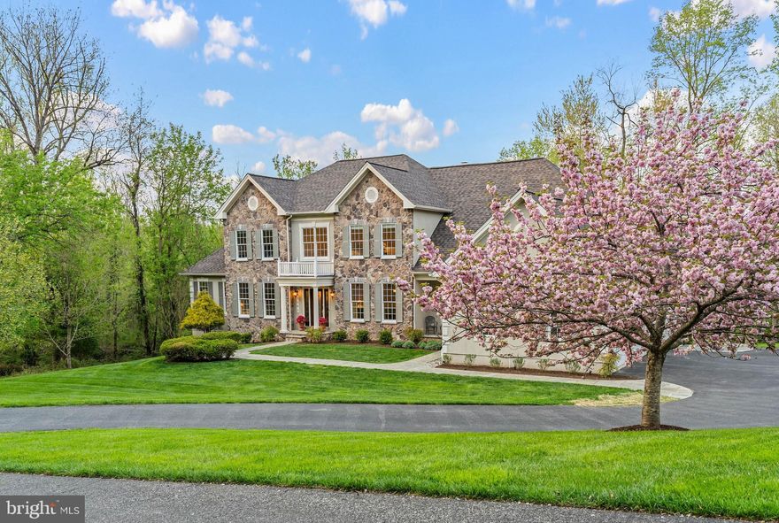 Live authentically. A rare offering in one of Baltimore County's most coveted neighborhoods in the Hereford zone. From its stunning curb appeal to its spectacularly designed interior, this property effortlessly blends timeless elegance with warm, inviting spaces. An expansive chef’s kitchen flows seamlessly into the spacious family room that is anchored by a striking stone fireplace, creating the perfect backdrop for both everyday living and sophisticated entertaining. Sunlight pours into the bright sunroom that can be used as a conservatory, playroom or as a peaceful space to simply unwind while surrounded by nature. Memorable gatherings await you in the formal dining room. A well-appointed office offers the ideal work-from-home retreat or quiet flex space. The lower level is nothing short of exceptional—an entertaining destination complete with an incredible bar, generous recreation space, gym and ample room for game nights, celebrations, and relaxed evenings with friends. Over 2,000 feet of finished space in the lower level with a walk out and nine foot ceilings. Relish all of the custom storage with separate access from an additional garage door. Exhale in the primary bedroom suite with its additional seating room, oversized walk-in closet and luxe bathroom. Step outside to a large Trex deck overlooking a sweeping, private backyard. A perfect setting for morning coffee or al fresco dining beside the fire pit. Spectacular summer nights are yours. Two-year old roof and newly epoxied garage. Do not miss this truly special opportunity to live in Hunt Valley Chase where homes are tightly held and where your new lifestyle can begin. Close to 83, Hunt Valley shopping, Wegmans and everywhere you want to be. Cultivate your existence. The art of uniting human and home.