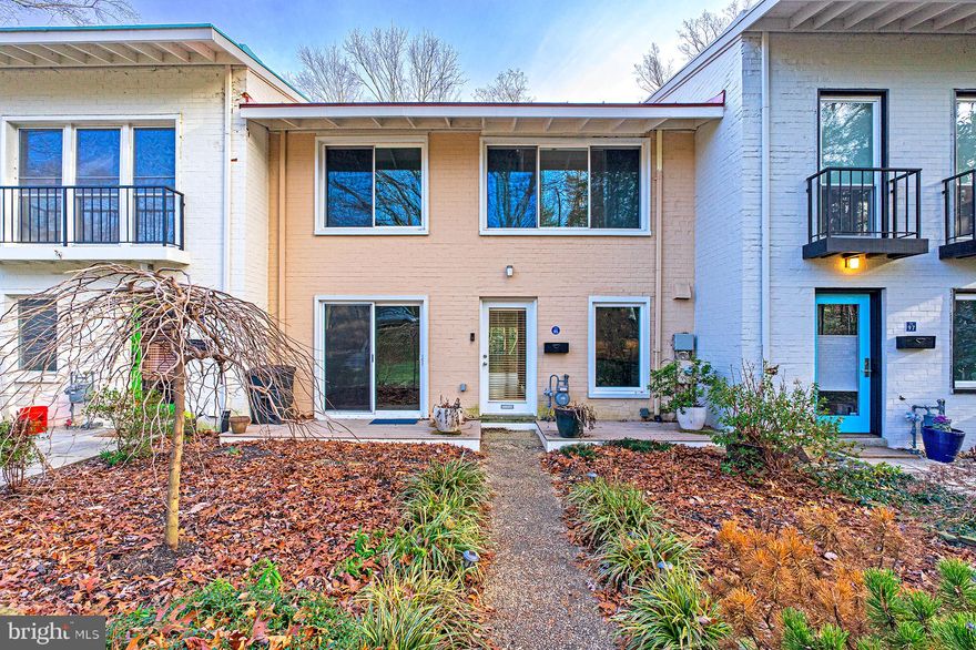 Charming mid-century modern townhouse at Reston’s Waterview Cluster. Located at the picturesque Lake Anne, this community was designed by award-winning architect Chloethiel Woodard Smith. This 3-level home has 3 bedrooms, 2 full + 2 half bathrooms. Features include large windows that let in an abundance of natural sunlight and solid hardwood floors throughout. The foyer opens to a light-filled, open living space with a cozy, wood-burning fireplace, built-in shelving/cabinetry & tree-lined views. Gourmet kitchen has granite counters, white shaker cabinetry with slide-out shelves, custom accent lights & stainless stain appliances. Separate dining room/office opens to front patio. All three spacious bedrooms on the top level have vaulted ceilings. Large owners’ suite boasts wonderful skylight windows, wall-in closet, 2 wall closets & an en-suite bathroom. Lower floor walkout has tall ceiling height, a spacious family room with a wood-burning fireplace & flex/laundry space for lots of storage options. Double sliding doors create an indoor-outdoor feel that connects to a rear deck & lush greenery. Water privileges at the Waterview Cluster Marina. Short walk to Lake Anne, Lake Anne Plaza, North Shore Pool & Reston trails. Minutes to Reston Town Center & Wiehle Metro.