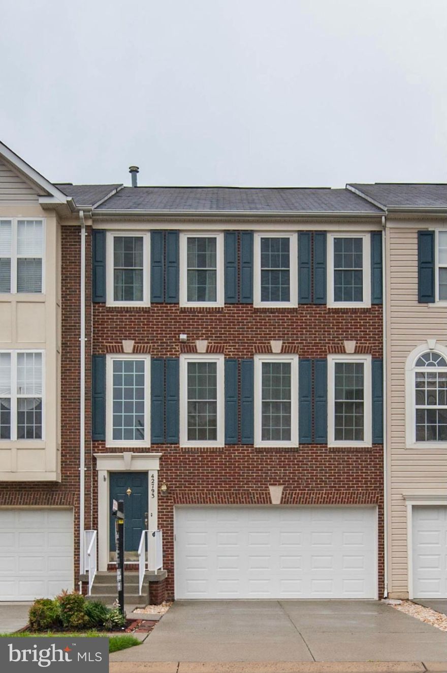 Gorgeous Brick townhouse w/ 2 car garage and 3 level bump out.  New Windows and sliding glass door, Hardwood floors, ceramic tile in the kitchen, New SS appliances, cozy FP in the family room, Deck spanning the length of the house, Private fenced yard, Master Bedroom w/ walk in closet and private luxurious bath w/ soaking tub.