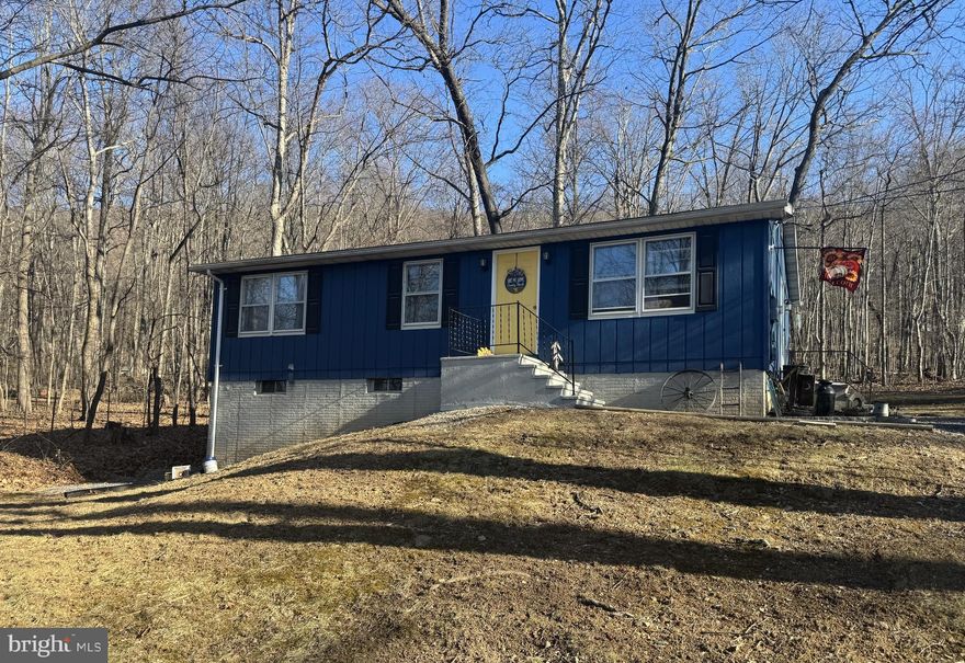 Nestled in community of Glenwood Forest, this charming one-level home offers the perfect blend of country living and convenience. Situated on a generous 1.1-acre lot with mature trees, the property provides privacy and a  natural setting. A spacious gravel driveway ensures plenty of parking for residents and guests alike. Step inside to discover a cozy yet functional layout featuring three bedrooms and one bath, ideal for those seeking comfort and simplicity. The heart of the home is the country kitchen, complete with ample table space and a pantry, making meal prep and gatherings a breeze. Just off the kitchen, a rear patio offers the perfect spot to unwind and enjoy the peaceful surroundings. For those looking for additional space or expansion potential, the full, unfinished walk-out basement comes with improvements already in place, offering endless possibilities for a workshop, recreation area, or future living space. Whether you’re seeking a tranquil retreat or a home with room to grow, this Glenwood Forest gem is ready to welcome you!