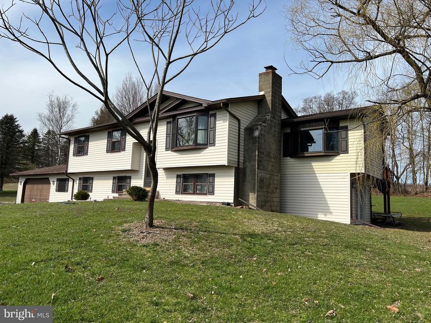 Nestled at the tranquil end of a cul-de-sac, this home boasts a picturesque location without an HOA. Embraced by the serenity of a tree farm and open farmland, this newly remodeled home offers an abundance of space and contemporary upgrades. The exterior showcases a newer roof and a charming shed. The entire HVAC system has been replaced for optimal comfort. Step inside to discover a completely revitalized interior, featuring a new kitchen adorned with modern appliances, sleek vanities, toilets, and stylish lighting. New carpet, vinyl and laminate flooring create a welcoming ambiance throughout. Basement features a built in bar and laundry room with quick easy access to lower deck making it ideal for entertaining Schedule your showing for this home today!