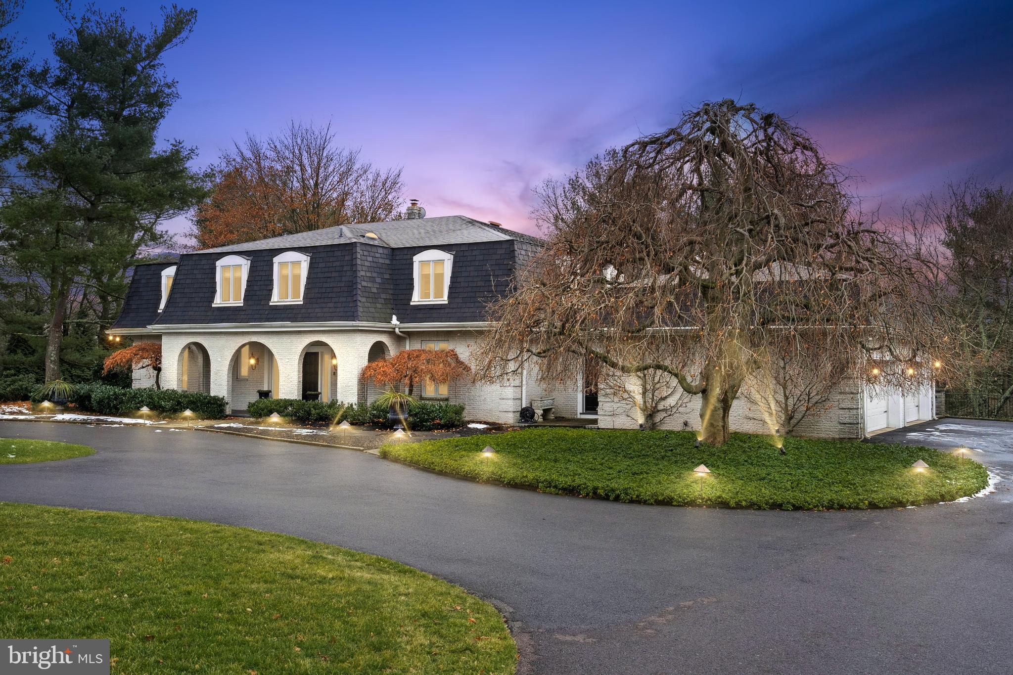 Welcome to 1348 Gypsy Hill Road, a stunning and elegant home on 2.4 private acres in sought after Gwynedd Valley. This exquisite property offers 7900 square feet of living space, with 5 bedrooms, 4 Full and 3 Half bathrooms, providing the utmost luxury and comfort.
Upon entering, you are greeted by a grand foyer with high ceilings and marble floors, setting the tone for the sophisticated design found throughout the home. The main level features a formal dining room, perfect for hosting elegant gatherings, while the formal living room and library/den provides a serene space for relaxation or work.
The heart of the home lies in the kitchen, complete with large island, Allmimo Kitchen Cabinets, and a separate eating area/ Breakfast Room. The adjacent sunroom and family room, with a cozy fireplace and built-ins, offers a seamless flow for entertaining or everyday living.
Upstairs, the primary ensuite is a private retreat, boasting a luxurious bathroom, dressing area and walk-in closets. 4 Spacious Family Bedrooms and 3 Full Baths Complete the second level.
The expansive basement houses several entertaining areas with bar and wine cellar adding an extra layer of luxury and convenience. The property also features an expansive private terrace, perfect for al fresco dining, and a spacious backyard with a barbecue area, ideal for outdoor entertaining.
Located in the highly desirable Gwynedd Valley, this home presents a rare opportunity to experience modern elegance in a coveted location. Don't miss the chance to make this extraordinary property your own.