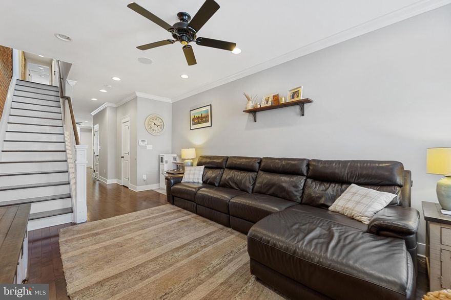 Welcome to your dream home with four years remaining on the CHAP tax credit, ensuring incredible savings on property taxes! This stunning property boasts a full renovation that seamlessly blends modern amenities with historic charm.

Step inside to be greeted by gleaming hardwood floors, exposed brick walls, and elegant crown molding throughout. The open concept living area is illuminated by recessed lights and features high ceilings, creating an inviting atmosphere for entertaining guests or relaxing after a long day. Whole house audio system.

The heart of the home is the white kitchen, complete with stainless steel appliances, granite countertops, and a peninsula with a bar stool area, perfect for casual dining or gathering with loved ones. Additional highlights include side windows and door, providing ample natural light, a pantry cabinet for added storage convenience, and a convenient half bath on the entry level.

Venture upstairs to discover three spacious bedrooms, including a primary bedroom with an en suite bath featuring a double vanity, walk-in shower with double shower heads, and a walk-in closet. The upper level also conveniently houses laundry facilities for added ease.

The fully finished lower level offers even more living space with high ceilings, a fourth and fifth bedroom, and a full bath, providing flexibility for guest accommodations or a home office.

Step outside to the rooftop deck and take in the breathtaking city views, perfect for hosting outdoor gatherings or simply unwinding under the stars.

Additional features include a 2-car parking pad in the rear, ensuring hassle-free parking, and two-zone heating and cooling for personalized comfort year-round.

Don't miss out on the opportunity to make this meticulously renovated home yours - schedule a showing today and experience urban luxury living at its finest!