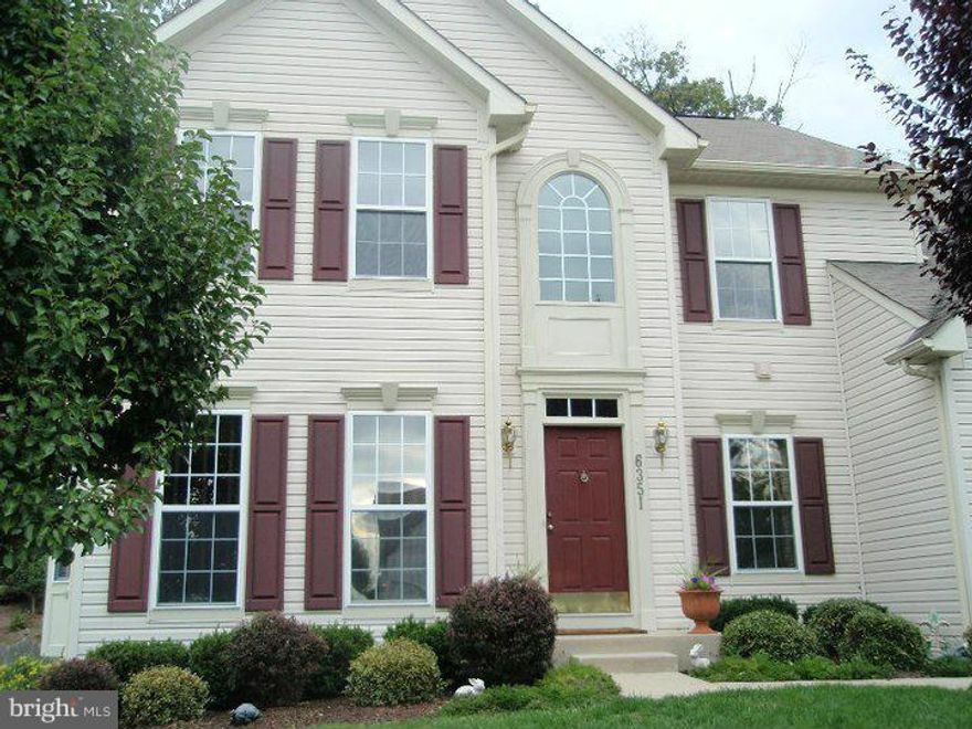 4BR 2 BA upstairs, MBR with tray ceiling, 2 walk-in closets & jetted tub. FR w/fp & built in entertainment center, upgraded kitchen. hardwood throughtout main level. Fully finished basement w/full bath, kitchen/wet bar, wired for surround sound, several storage areas- great for in-laws. Backs to woods ample privacy, landscaping with 2 large patios.