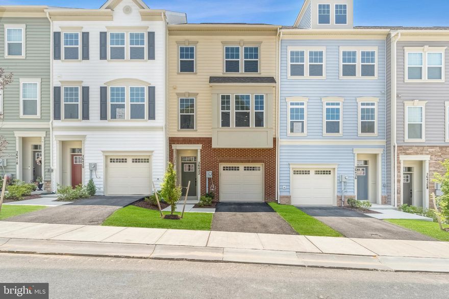 IMMEDIATE DELIVERY - Beautifully designed new construction townhome in the heart of Damascus, MD! This modern 3-bed, 2.5 bath home offers 2017sq. ft. of thoughtfully designed living space, perfect for comfortable and stylish living. As soon as you enter the front door, you are greeted by a bright foyer leading to a lower level rec room, leading out to a private backyard. Heading up the oak staircase to the main living level, you will find an Open-concept floor plan with spacious living and dining areas. The sleek kitchen features an oversized island with quartz countertops, stainless steel appliances & custom cabinetry. The dining room features a box bay window bumpout. The spacious Great Room opens up to a Trex deck overlooking trees.  Upstairs, the Luxurious primary suite is complete with a walk-in closet and spa-like en-suite bath. Laundry room is conveniently located upstairs, along with 2 other bedrooms and hall bath. Energy-efficient features including smart home technology and high-performance windows. The exterior includes a 1-car Attached garage and additional parking for convenience, as well as Private outdoor space perfect for relaxing or entertaining. Located in a vibrant new community, this townhome offers easy access to major highways, shopping, dining, and top-rated schools. Enjoy nearby parks, walking trails, and all the charm that Damascus has to offer! Special incentives available for a limited time! Don't miss the opportunity to own this brand-new townhome in a fantastic location. Schedule your tour today!