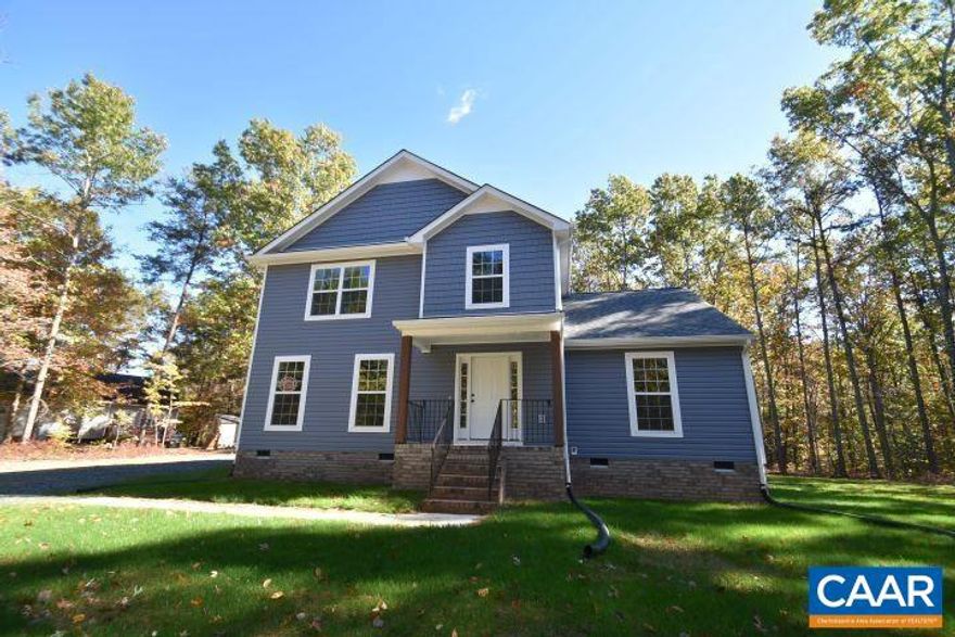 TO BE BUILT! The Monterey model on 2.228 acres in Louisa. Gorgeous open floor plan with laminate flooring throughout the main living areas, spacious great room, open kitchen layout, stainless appliances, granite countertops, upgraded 36" Tier 2 cabinets with crown molding, 2x7 island with overhang, and half bath. The Primary suite, on the main level, comes with a vaulted Ceiling, a ceiling fan, walk in closet, and an attached full bath with a 5' shower and double bowl vanity! Upstairs you'll find 3 additional bedrooms with LED lights, a full bath, and pull down attic for extra storage. Adult height toilets in primary and half bath, 10x12 deck for entertaining, and an upgraded exterior with wide window trim instead of shutters, black windows on the front, black gutters, and 8" stained porch columns. Call today to ask how you can receive 2.5% of your closing costs paid. No money down loans available. Photos are of a similar completed home. Winter completion! Still time to customize this home to make it your own!,Granite Counter,Wood Cabinets