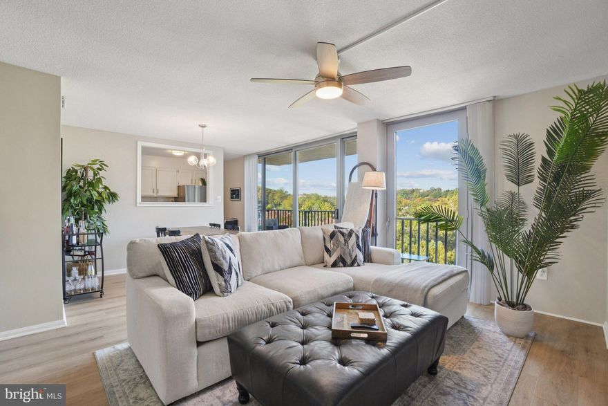 Welcome home to this light filled 8th floor condo featuring brand new luxury vinyl plank flooring and fresh paint throughout. The spacious living room showcases floor to ceiling windows and a sliding glass door leading to a private balcony with peaceful views of the Four Mile Run trail and stream.
The updated kitchen shines with white cabinetry, modern hardware, quartz countertops, a subway tile backsplash, and all new stainless steel appliances (2024). A convenient pass through window opens to the dining area, highlighted by a stylish contemporary light fixture.
The generous bedroom offers two walk in closets and tranquil outdoor views, while the refreshed bathroom features a large white vanity with ample storage, a new mirror and lighting, and a sparkling tiled shower. A hallway storage closet adds extra convenience.
Two reserved parking spaces convey, and all utilities are included in the condo fee.
The Carlton’s resort style amenities include a community pool, tennis courts, 24 hour security and concierge, a fitness center with sauna, community room with ping pong and study space, party room, and in building deli.
Ideally located near I 395, The Village at Shirlington, Barcroft Park, and the W&OD Trail with quick access to the Pentagon and downtown DC, this condo offers the perfect blend of comfort, convenience, and lifestyle.