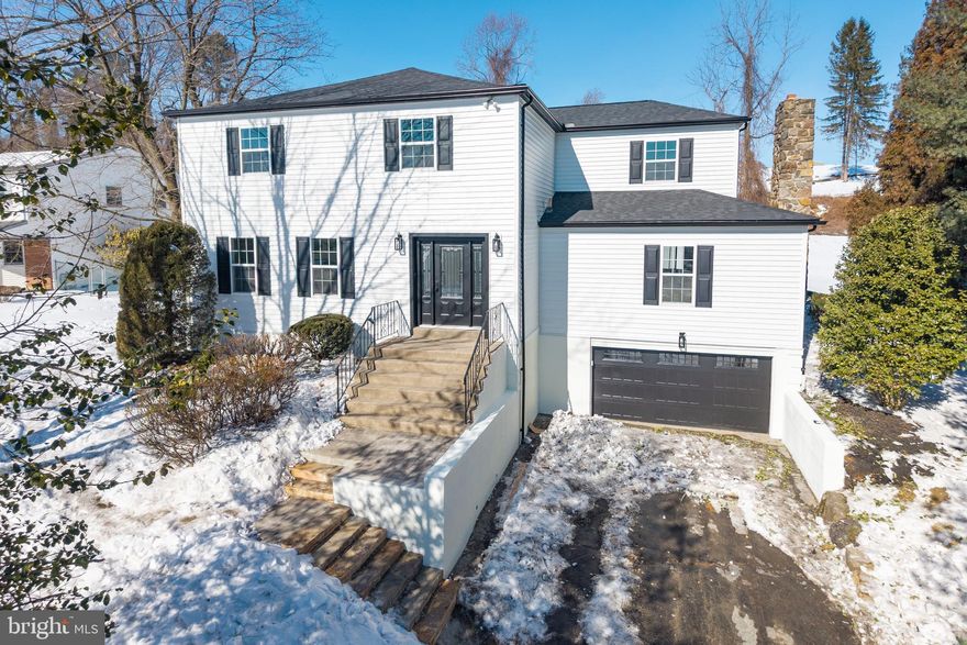 This luxury single home has been fully renovated from top to bottom with thoughtful design, quality finishes, and modern systems throughout. Updates include a new roof, siding, windows, all new flooring, a fully redesigned kitchen and bathrooms, a finished lower level, a new paver patio, and new front landscape steps. A new driveway will be completed when the weather permits.

The first floor features hardwood floors throughout and a layout designed for both everyday living and entertaining. The kitchen is a true focal point with quartz countertops, white cabinetry, a statement range hood, a beverage refrigerator, a large center island, and a pantry. It opens seamlessly to a generous dining area and family room with exposed ceiling beams, a brick wood-burning fireplace, and a sliding door that leads to the private backyard patio. A spacious living room and powder room complete the main level.

Upstairs, the primary suite offers recessed lighting, a ceiling fan, a walk-in closet, and a beautifully finished primary bathroom with ceramic tile, dual vanities, and a walk-in shower with custom tilework. Three additional bedrooms are generously sized, and a new full hallway bathroom with a tub-shower combination that serves the secondary bedrooms. The second floor also includes a convenient laundry area.

The finished lower level adds approximately 900 square feet of additional living space and is freshly carpeted, offering flexibility for a media room, home office, gym, or play space.

Located in the award-winning Radnor Township School District, this home sits on a quiet cul-de-sac in the Hills of Bryn Mawr. The neighborhood offers a trail leading to Ithan Elementary School and acres of landscaped open space for walking and outdoor enjoyment. Convenient access to Route 476, Route 3, shopping, dining, and the train makes this location both peaceful and practical.