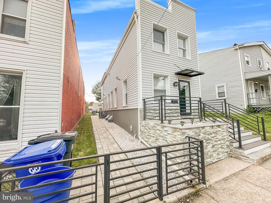 Discover urban living at its finest with this stunning, modern detached home in the heart of Baltimore City! Just minutes from downtown, this home offers unbeatable convenience, with a police station right next door and quick access to I-95 for an effortless commute. Imagine waking up to scenic river views and spending your weekends enjoying the nearby park, complete with a bike trail, community center, and basketball court—perfect for outdoor adventures.

Step inside to experience luxury living with all the modern amenities you could dream of, from sleek recessed lighting to elegant framed glass showers. The finished basement provides extra space for entertainment, a home gym, or a cozy retreat. But the real showstopper is the expansive backyard, a true gem in the city, offering plenty of room for outdoor gatherings, gardening, or simply soaking up the sun. And with private, fenced-in parking that can accommodate up to 7-8 vehicles, you'll never have to worry about finding a spot.

This home is a rare find in Baltimore City, combining style, comfort, and practicality in one perfect package. Don’t miss out—schedule your showing today and step into your new urban oasis!