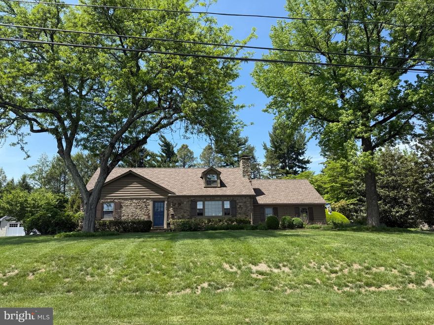 This classic Luther Nash stone and frame Cape Cod-style home offers timeless charm and flexible living with one or two bedrooms on the main floor. A fabulous sunroom addition by Jarrett Vaughan provides a light-filled space to relax and enjoy views of the spacious yard, which features a flagstone patio and beautifully crafted stone retaining walls. Inside, hardwood floors run throughout the home, adding warmth and character. The gracious living room includes a cozy fireplace, while the formal dining room is enhanced by elegant French doors. Located in a prime Doylestown Borough setting within the award-winning Central Bucks School District, this home is a rare find in an exceptional location.