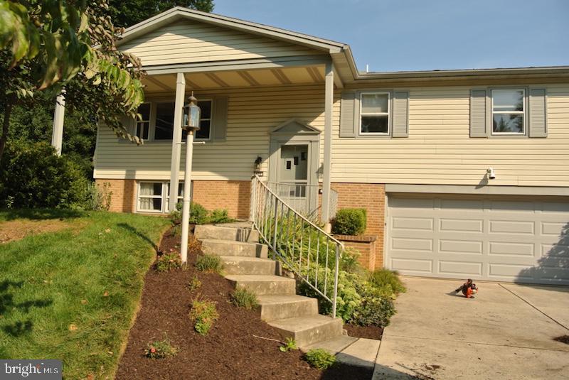 Pet possible for qualified tenant. Beautifully renovated 3 bedroom 3 bathroom single family home, with central air, an eat-in kitchen, living room, lower level family room, 2 car garage, end of a cul-de-sac backing a forest area. Beautiful kitchen with a glass cook-top and double oven. One year old paint and carpet. Sliding glass door to the private backyard and rear patio. Monthly pet fee $50/month and $1000 refundable deposit.