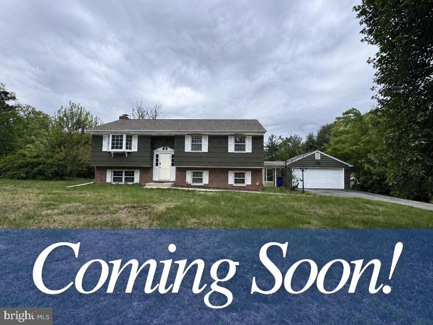 Welcome to this well-maintained 4-bedroom, split-level 2.5-bath home situated on a large 0.92-acre lot in sought-after Highland, MD. The main level features hardwood and ceramic tile floors, new mid-century lighting and fresh paint throughout. The kitchen was thoughtfully updated in 2018.  This home offers a functional layout with 1,220 finished square feet above grade and a fully finished lower level featuring a spacious family room with woodburning fireplace and raised hearth and brand new carpet. An additional bedroom, half bath, exit to rear yard and ample storage complete this level. 
Enjoy outdoor living with a covered breezeway, a deck overlooking the flat, open backyard which is ideal for Summer fun! A breezeway connects to the detached 2-car garage. Storage shed conveys as-is. Major systems have been updated, including a new roof in 2023 (30-year Duration shingles), HVAC replaced in 2016, water heater in 2020 (recently serviced), well motor (2018), and pressure tank (2023). The home is serviced by well water with a reverse osmosis system and septic. 
This property offers a rare combination of space, updates, and flexibility in a highly desirable area. No HOA.