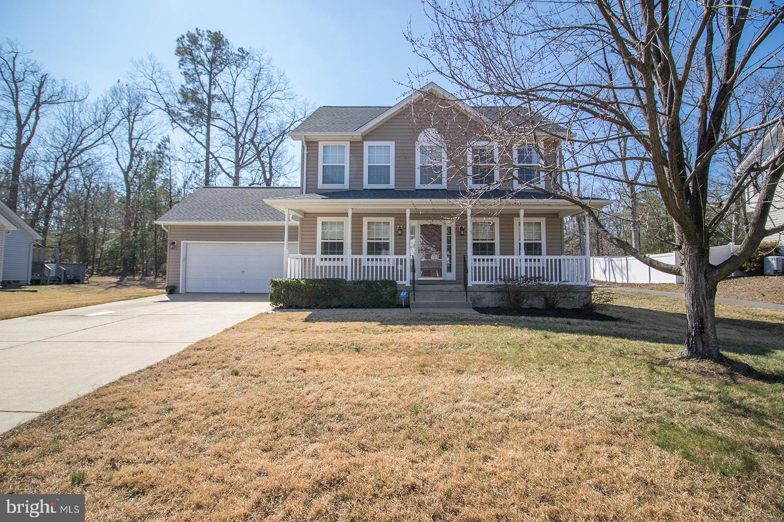 This adorable home can be your new home today!  The main level of the home has luxury vinyl plank flooring throughout.  Formal Dining room with chair railings off foyer.  Open concept kitchen & family room.  Kitchen has updated stainless appliances and an island.  The family room is off the kitchen and has a gas fireplace.   Kitchen sliders open to back yard with deck great for relaxing or having a cookout.  Primary bedroom with vaulted ceilings and walk in closet.  Primary bath includes dual sinks, corner jetted tub and separate shower.  3 additional bedrooms and a full bathroom in the hall complete the upper level of this home.  2 car garage and large driveway.   Close to schools, shopping and area amenities.  Easy access to both Route 235 and Route 5 for those commuting to base or college.   Schedule your online appt today.