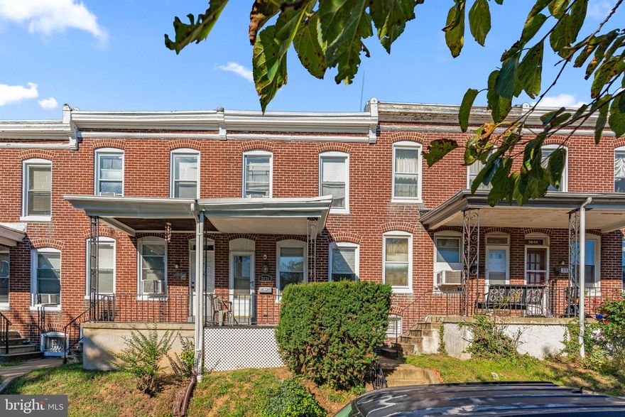 Charming and well-maintained row home in vibrant Waverly, featuring a welcoming covered front porch perfect for relaxing and 1,460 square feet of living space including 2 bedrooms and 1 full bath.  Step into the spacious main level, where a sunlit living room welcomes you and seamlessly transitions into the formal dining room. The cozy kitchen features ample cabinetry, a gas cooktop, and convenient exterior access to the fenced backyard offering lush landscaping, creating a functional space for indoor-outdoor living and entertaining. The upper level features a full bathroom and two spacious bedrooms with plush carpeting and ample closet space. The primary bedroom serves as a welcoming retreat, offering plenty of room for lounging. The lower level offers a versatile space ready for your personal touch, making it perfect for storage or future customization to suit your needs.Waverly offers a variety of restaurants, shops, services, and local parks like Waverly Park, which provides recreational opportunities such as playgrounds, sports fields, and picnic areas. Conveniently, Waverly is located near major roads like North Avenue and Charles Street, providing easy access to downtown Baltimore and other parts of the city.