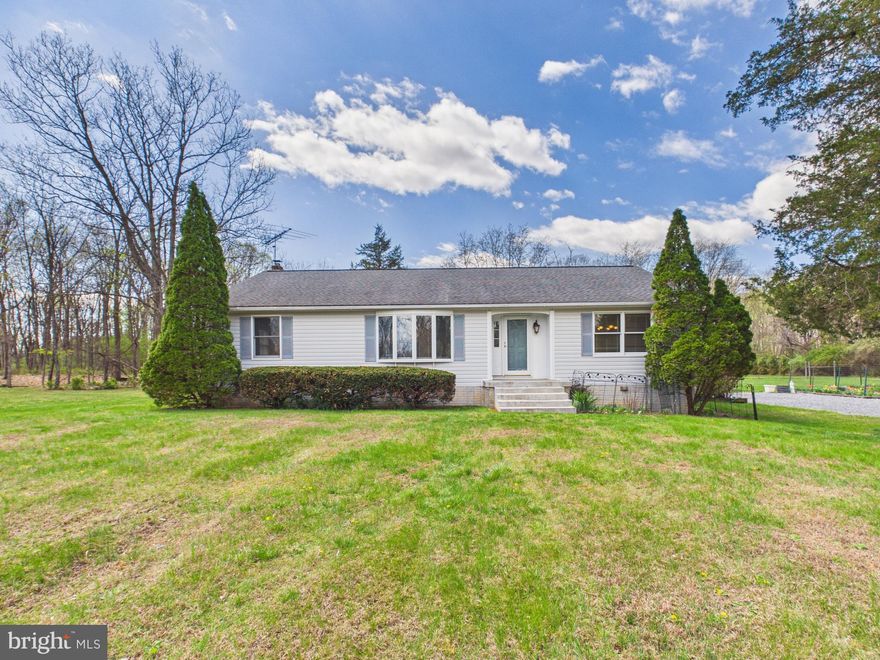 Hard-to-find level acreage meets comfortable country living in this well-maintained Foremost modular home, perfectly situated on 5.16 park-like acres in the quiet subdivision of Apple Tree Farm—right along the Virginia line.

This property is a true standout, offering rare, usable LEVEL ground that opens the door to endless possibilities—gardening, recreation, additional structures, or simply enjoying wide-open space without the typical terrain challenges.

Inside, you’ll find a functional layout featuring 3 bedrooms and 2 full bathrooms, complemented by recent upgrades that add both comfort and peace of mind. A newer architectural shingle roof, a TRANE central HVAC system, RainSoft water softener, and UV light filtration system all contribute to efficient, modern living. For added warmth and character, the home is equipped with both a pellet stove and a wood stove (not hooked up)—perfect for cozy evenings and supplemental heating options.

The full unfinished basement provides a blank slate for future expansion, workshop space, or ample storage with it's many storage shelves.

Step outside to enjoy a self-supporting rear deck overlooking your expansive backyard, along with an enclosed garden area ready for your homegrown produce. Two storage buildings offer even more flexibility for tools, equipment, or hobbies. With parking space for up to 7 vehicles, there’s plenty of room for guests, trailers, or recreational vehicles. This property is also allowed up to two horses or cattle. 

Whether you're looking for space to spread out, room to grow, or a peaceful setting with convenience to the Virginia line, this property delivers a rare combination of land, upgrades, and potential.