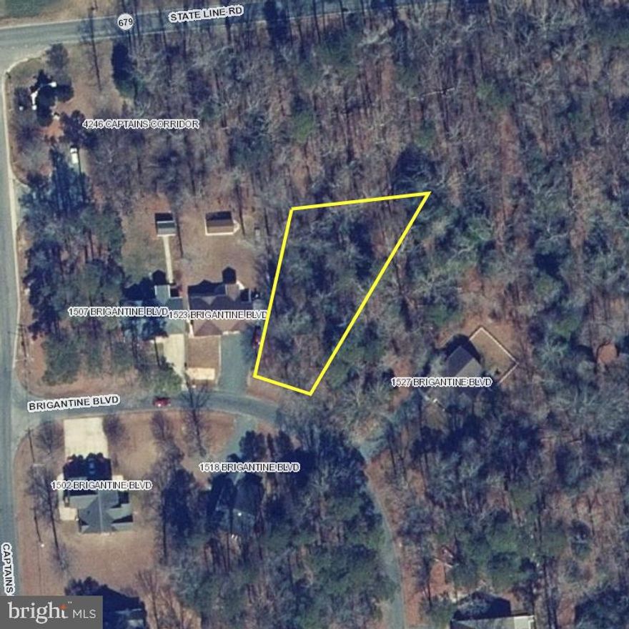 Large, buildable lot available in the sought-after Captains Cove community! Located at Lot 4 Brigantine Blvd, this spacious parcel offers nearly 16,000 square feet, making it about one-third larger than the average lot in the neighborhood. Best of all, there is no builder tie-in, giving you the freedom to design and build your dream home on your own timeline. Residents enjoy an impressive lineup of amenities, including three pools (two outdoor, one indoor), a fitness room, golf course, boat launch, fishing pier, dog parks, walking trails, playground, and pickleball and basketball courts. Don’t miss your chance to own a piece of this coastal oasis—call today for more details about this lot and everything the community has to offer!