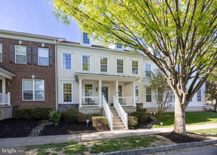 Welcome to this thoughtfully upgraded townhome in the sought-after Windsor Ridge community, perfectly situated in Chester Springs with coveted Downingtown East School District and STEM Academy access. From the moment you arrive, the charming covered front porch sets the tone for the quality and care found throughout this exceptional home. The heart of the first floor is a well-designed custom kitchen remodel featuring an abundance of cabinetry with soft-close drawers and pull-out shelving, gleaming quartz countertops, a quartz island with large sink, stainless steel appliances (Fisher & Paykel refrigerator, Electrolux 5-burner gas cooktop, and Miele dishwasher), a hood venting to the exterior, a beverage cooler, and a generous pantry closet with pull-out shelves. Refinished natural hardwood floors and recessed lighting flow throughout the entire first floor, complementing the comfortable family room with gas fireplace, separate living and dining rooms with crown molding, and an updated powder room. A stunning remodeled staircase with hardwood treads and metal spindles leads upstairs, while a patio door opens to an expansive Trex deck. The primary suite impresses with a tray ceiling, walk-in closet with organizer, and a beautifully finished bath with soaking tub, tiled shower, and double-bowl vanity. Two additional bedrooms each feature walk-in closets with organizers and share a remodeled hall bath with tile walls and walk-in shower. Hardwood floors and recessed lighting continue throughout the second floor, with a convenient laundry closet completing the level. The finished lower level with egress window adds 750 square feet of living space, including a recreation room with projector, screen, and speakers, plus a flexible room ideal for a home office or guest room. Additional features include a Tesla charging station, bidet seats for two commodes, keyless door entry, and decorative moldings throughout. Enjoy Windsor Ridge's resort-style amenities — clubhouse, pool, tennis, basketball, ball field, and tot lot. Relax on the front porch and take in peaceful views of the open space and recreation area. Award-winning Downingtown East Schools and the nationally recognized STEM Academy complete the picture. Schedule your private tour today — this one will not last.