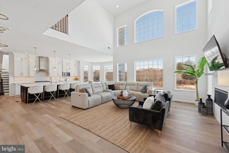 Nestled in the prestigious Ventry Community at Edgemont Preserve 115 Parkview was custom built  in 2023, a Devonshire Manor model, with 5100 sq. ft of living space, 6 bedrooms, a three-story bump-out, all bedrooms built as en suites baths, and 2400 sq. ft of Walkout Basement that is unfinished, offering abundant space for storage or future expansion. Located within the highly sought-after Rose Tree Media School District, 10 minutes driving distance to all the restaurants at Ellis Preserve, this home offers a harmonious blend of modern luxury and timeless elegance, surrounded by the serenity of nature.
The home was designed with sophistication and functionality in mind and the owners spent $400,00 in upgrades when they built this home.  Stunning wide-plank wood floors, soaring ceilings, and architectural details that set the tone for the home’s luxurious ambiance.  An elegant Dining Room, leading to the Butler’s Pantry and the Gourmet Chef’s Kitchen, creating distinct yet interconnected spaces ideal for entertaining and convenience.  The Chef’s kitchen, a culinary haven equipped with high-end appliances, including a SubZero fridge, farmhouse sink, upgraded cabinets, wine cooler, quartz countertops, and a generous eat-in island. The kitchen leads to a Breakfast area and a grand 2-story Family Room with stunning views of the private backyard, a cozy gas fireplace, perfect for hosting gatherings. A stunning glass conservatory and  creatively conceptualized library space is a wonderful extra! Back through the kitchen is the Second Staircase, powder room, mud room with Custom Built-Ins and an expansive office/bedroom with an ensuite bathroom and walk-in closet.
Upstairs, the luxurious owner’s suite is a tranquil retreat, featuring large bay windows, a tray ceiling with a ceiling fan, and two his and hers custom walk-in closets. The ensuite bathroom is a spa-like haven, with marble and granite finishes, spacious shower, a jacuzzi tub, Dual vanities, wall-to-wall tiled backsplash. Four additional bedrooms, each with walk-in closets and bathroom access, offer comfort and privacy, while a dedicated laundry room adds convenience to the upper level.
 Outdoors, enjoy a Private backyard, with scenic vista views. Community amenities include a Clubhouse, fitness center, basketball court, and pool, with space for a private pool on the property. 115 Parkview Way is more than a home—it’s a lifestyle. Experience unparalleled comfort and luxury in this meticulously crafted residence. Schedule your private showing today!