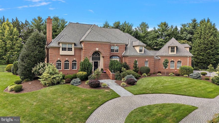 Welcome to 609 Edgehill Road, an exquisite residence nestled in the prestigious Westover Hills neighborhood of Greenville. This stately all-brick home, set back from the road, is situated on a lush 1.9-acre lot, offering privacy and unparalleled elegance. Upon entering, you are greeted by a grand foyer with a gently, sweeping curved staircase that sets the tone for the sophisticated interior. The first floor boasts a luxurious primary suite, a spacious office, and an updated eat-in kitchen adorned with quartz countertops. The heart of the home is the magnificent two-story living room, featuring an overlook from the second-floor foyer, and a delightful family room with a vaulted ceiling. Entertain in style in the expansive formal dining room, or cozy up by one of the four fireplaces scattered throughout the home. The second floor is home to four generously sized bedrooms and three full baths, providing ample space and comfort. The finished lower level includes a full bathroom, perfect for guests or additional living space. Outdoor living is elevated to new heights with a stunning brick terrace, an in-ground pool surrounded by a paver patio, and a greenhouse for the gardening enthusiast. The paver driveway leads to a three-car garage. A full house back up generator provides extra reassurance in bad weather. This 5000-square-foot masterpiece combines timeless elegance with modern comforts, making it a truly exceptional property. Experience the epitome of luxury living at 609 Edgehill Road – a home that promises to captivate and inspire.