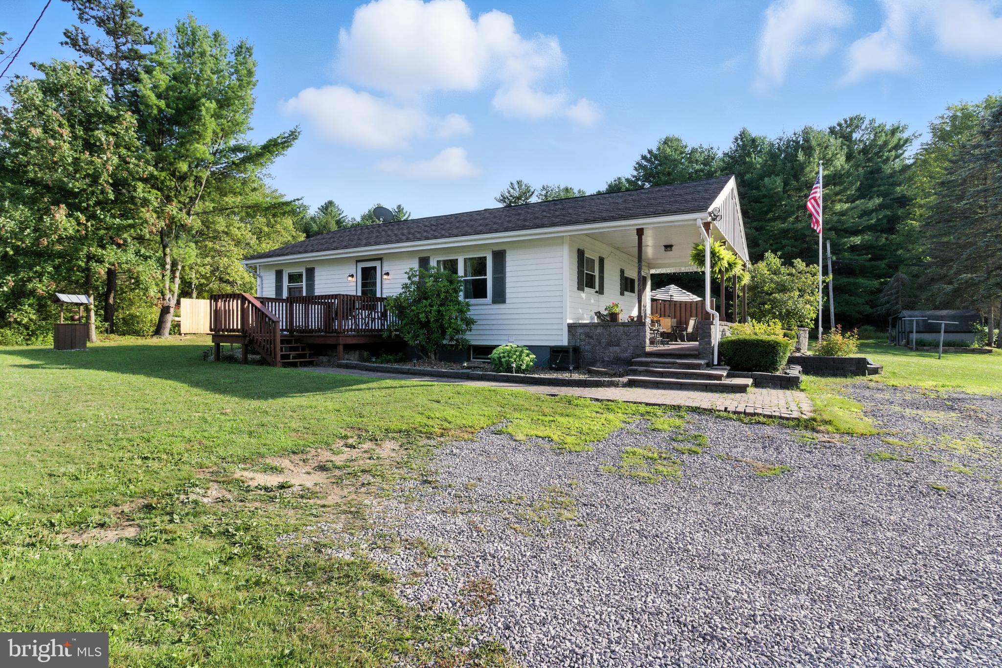 Nestled on the outskirts of Clearfield, this beautifully updated ranch home offers the perfect blend of charm and functionality on a generous 0.68-acre lot. Boasting three comfortable bedrooms and a full bathroom, this home features a spacious open living area with vaulted ceilings and a cozy ventless fireplace, perfect for relaxing or entertaining. The modern touches continue with an updated roof and windows, central AC for year-round comfort, and a layout designed for practical living. Storage won’t be an issue here, thanks to the abundance of space throughout, including a partially finished basement that houses laundry and workshop areas. Outside, enjoy the patio complete with a fire pit, ideal for summer evenings under the stars. With thoughtful updates and room to grow, this property is a true gem waiting to welcome you home. Call today!