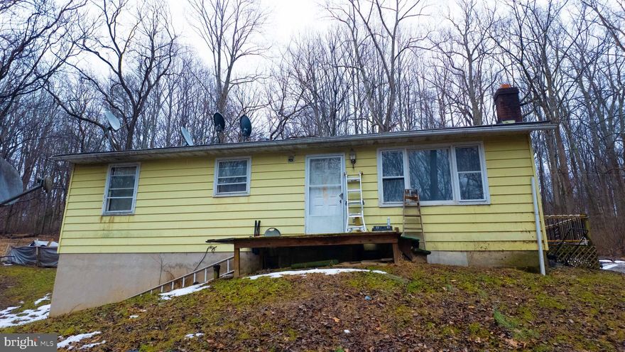 A compact 1-story rancher with a full basement on a massive 1.04-acre wooded lot, offering the ideal structure for a modern renovation or expansion.  Ideal for Savvy investors or first-time homebuyers looking to customize via a 203k or rehab loan, this Marriottsville property offers the rare opportunity to build instant equity.  Schedule your viewing today. WILL NOT LAST LONG..  Schedule your viewing today. WILL NOT LAST LONG. BRING ALL OFFERS